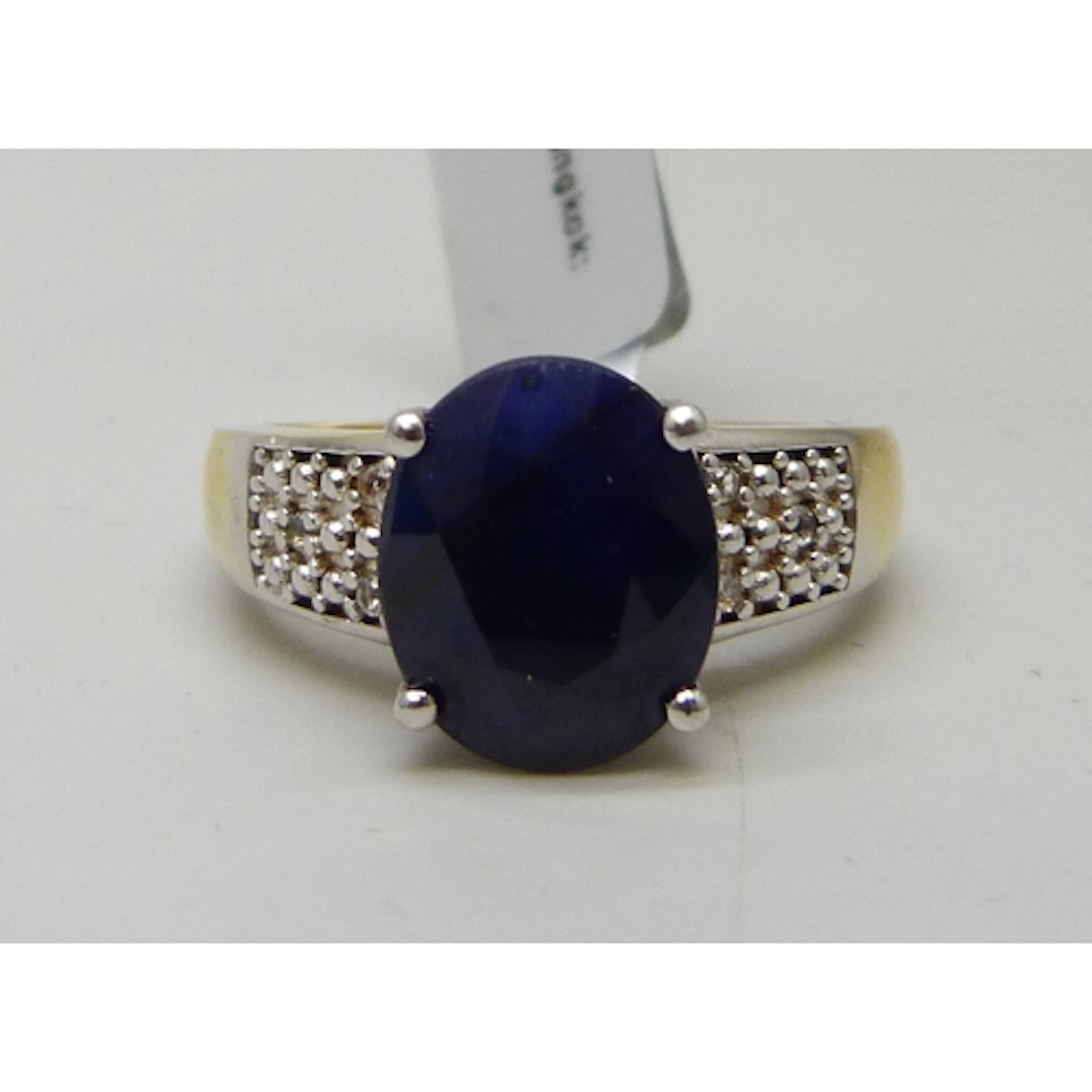 A TGGC silver gilt sapphire and possibly white topaz ring, T...