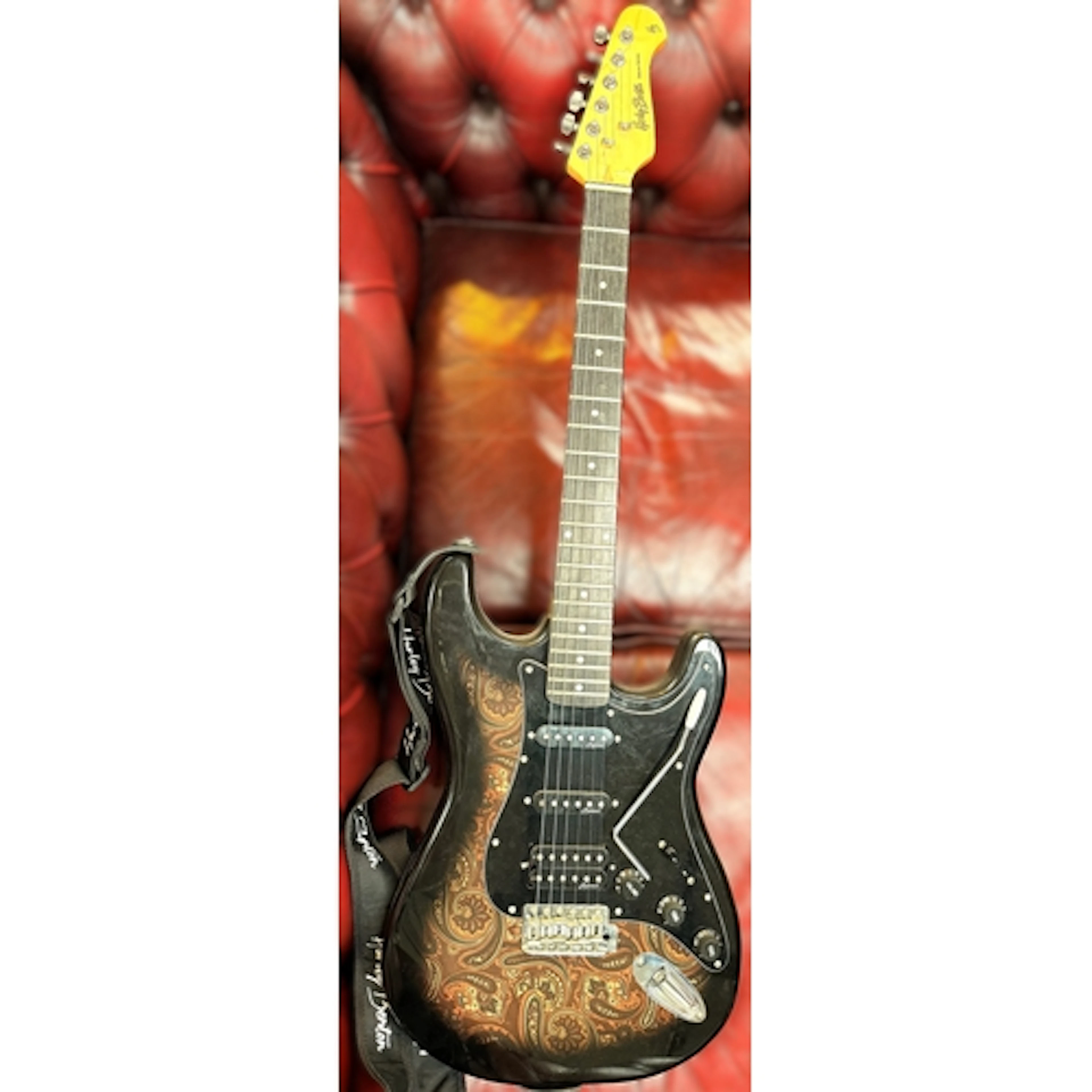 A Harley Benton Deluxe series ST-70 Black Paisley electric g...