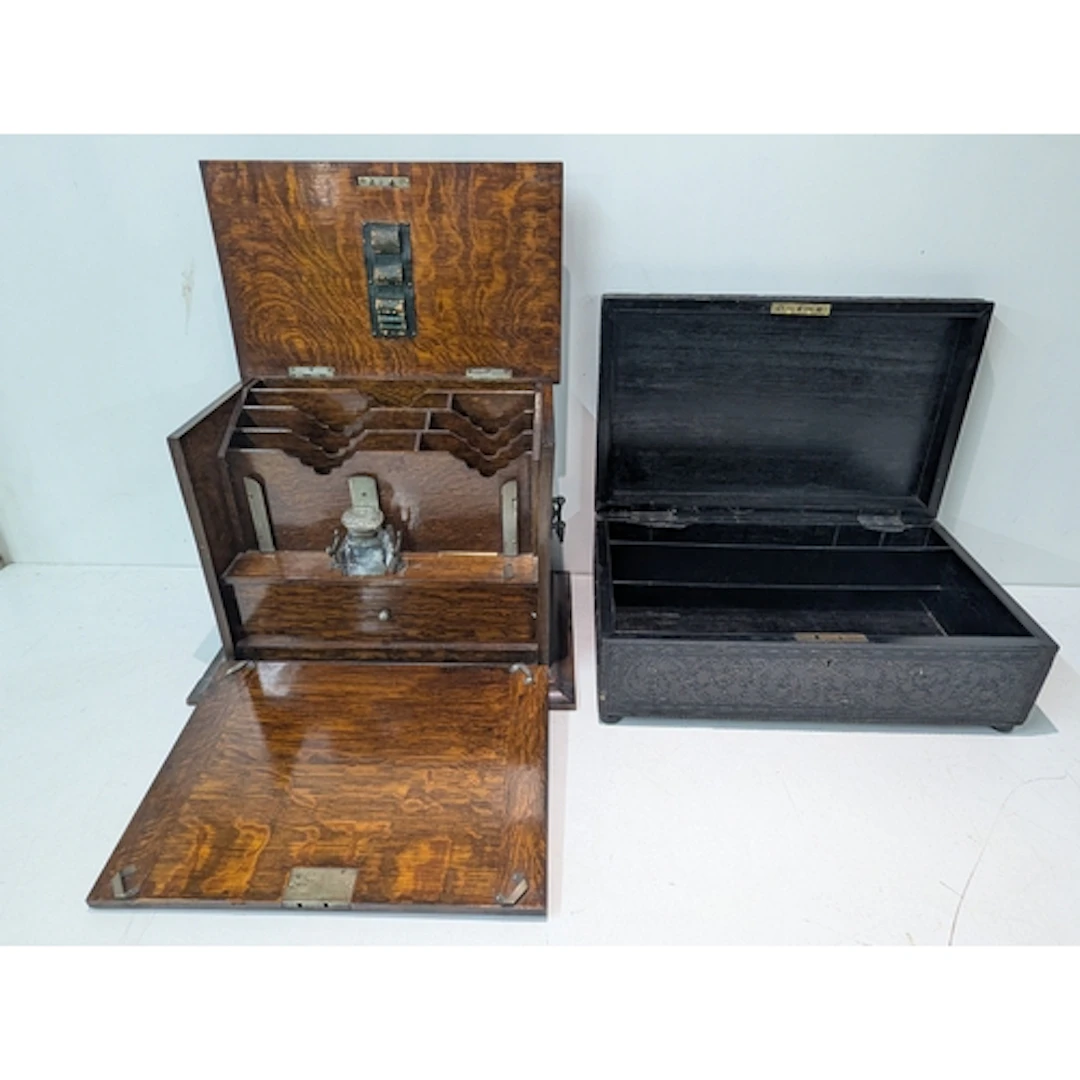 A late 19th century/early 20th century oak desktop stationer...
