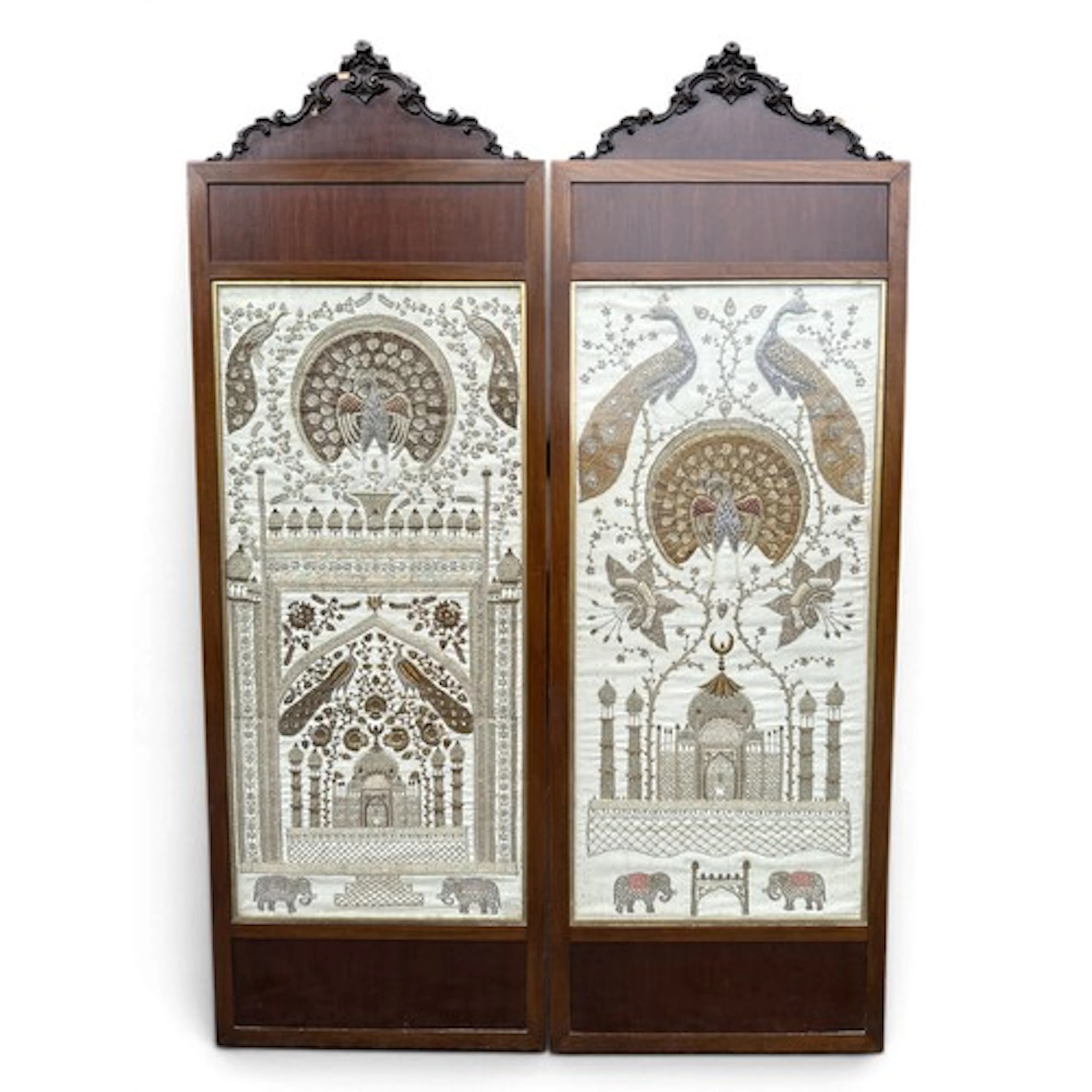 An Indian two fold screen with two glazed embroidered silk p...