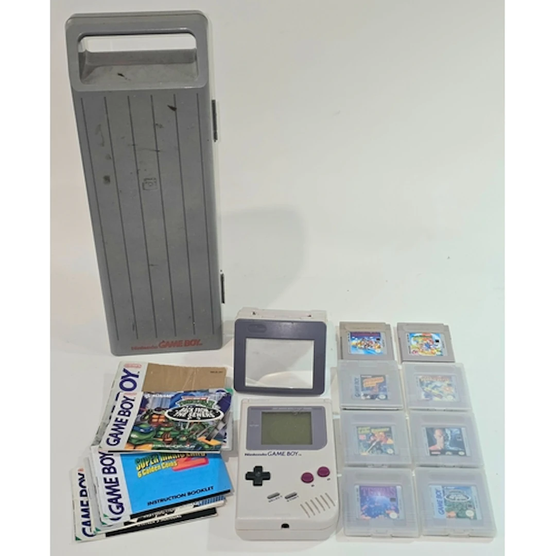 Vintage Nintendo Game Boy handheld console in Game Boy brand...