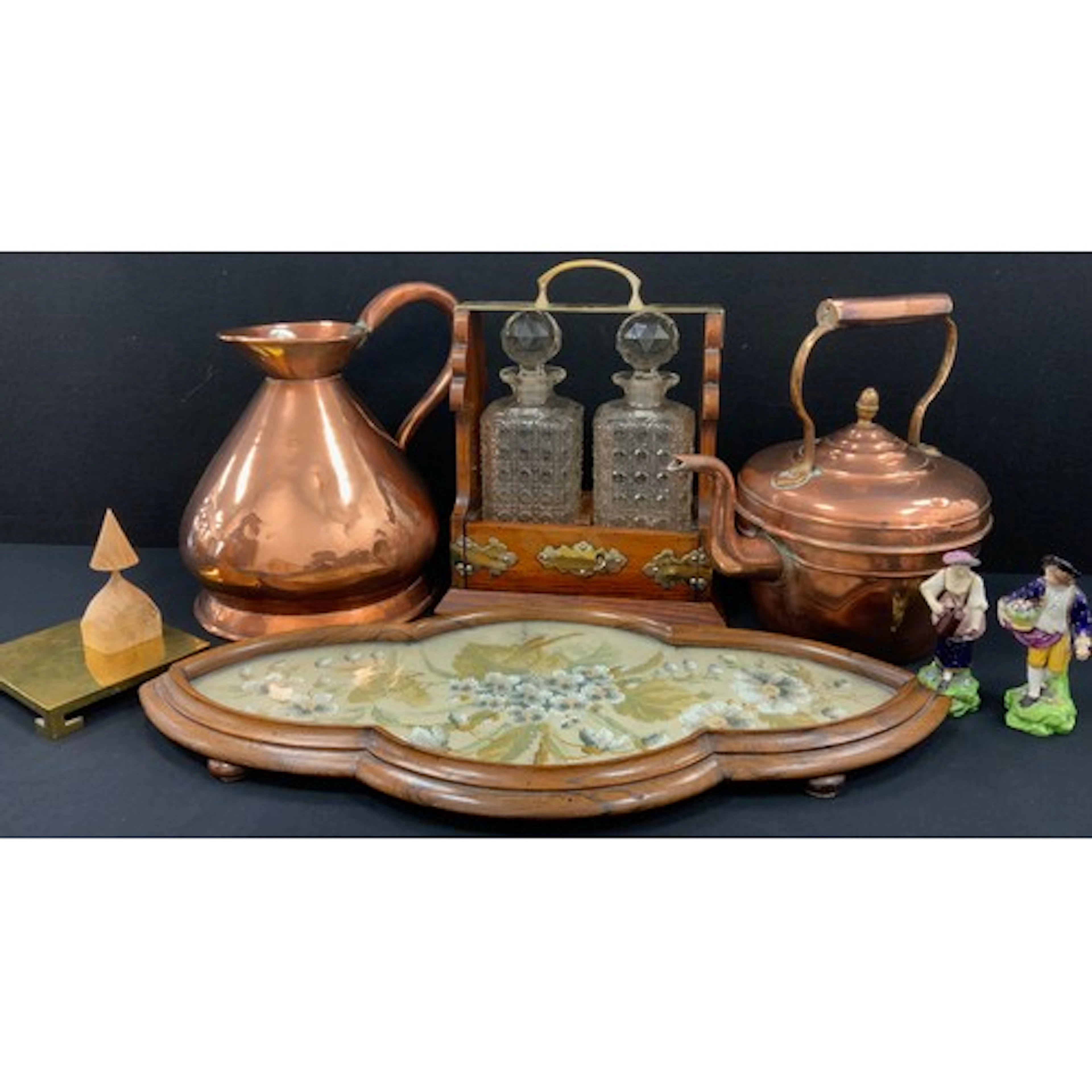 A late 19th century oak two-decanter tantalus, brass carryin...
