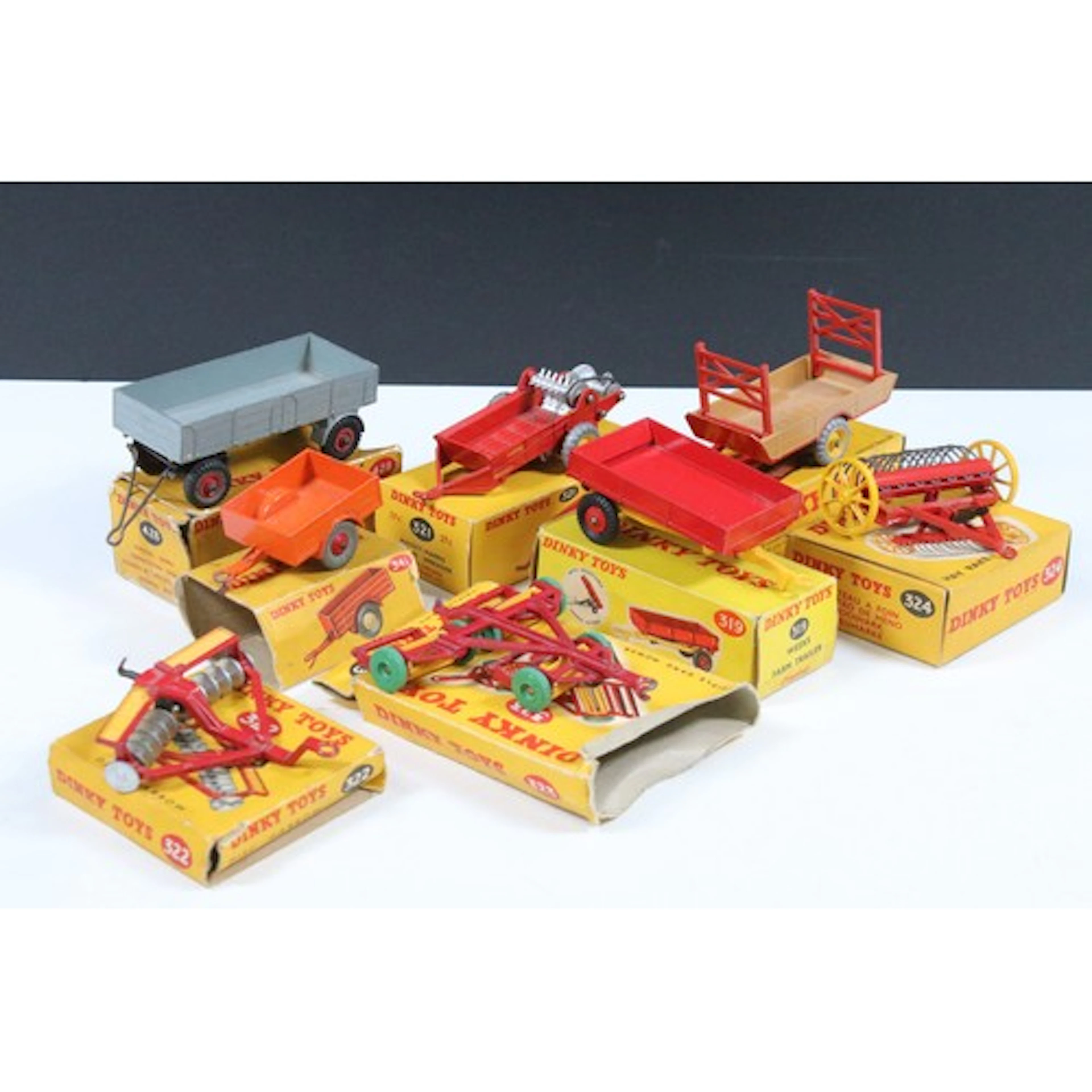 Eight boxed Dinky farming diecast models to include 323 Trip...