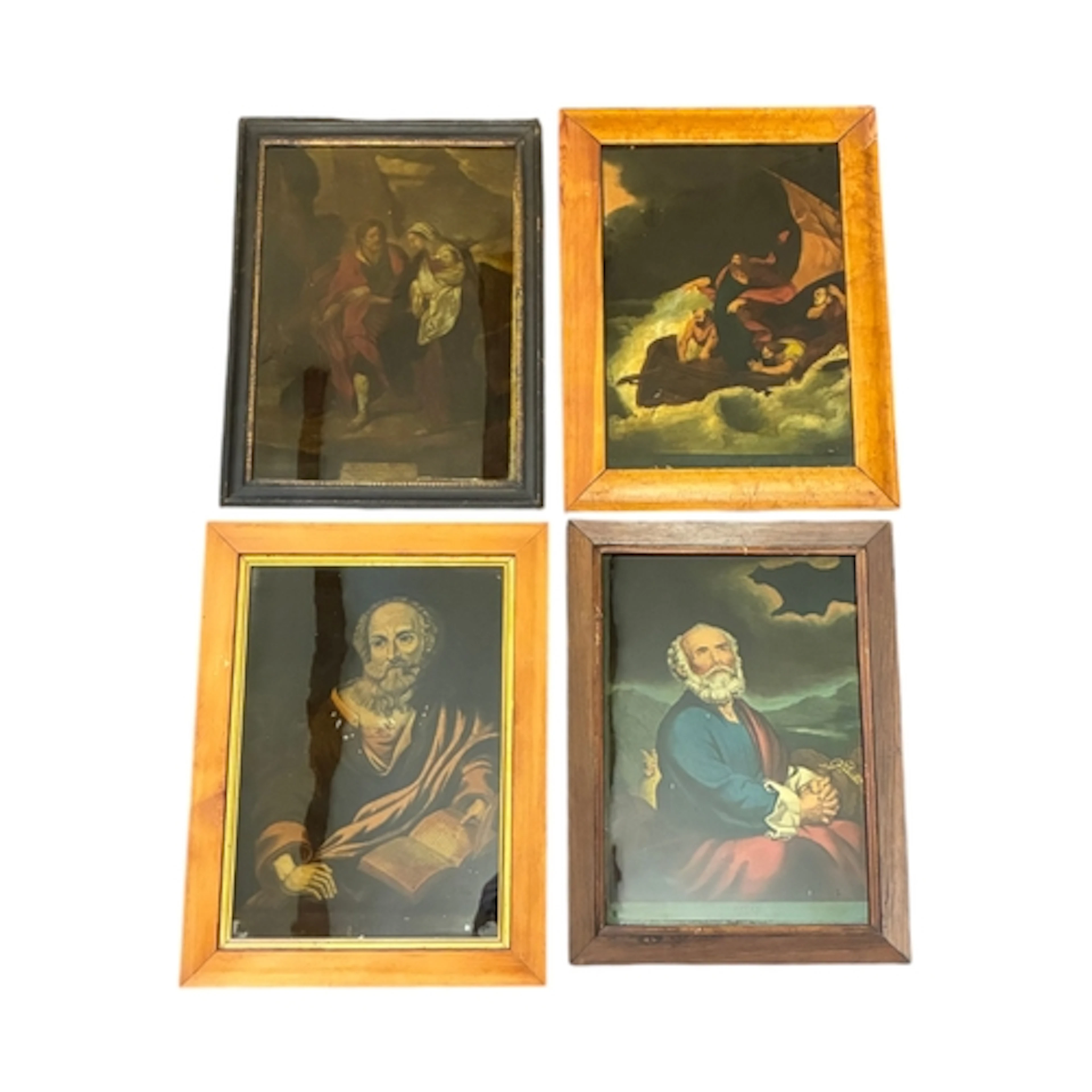 Four 18th-19th century reverse glass prints, featuring relig...