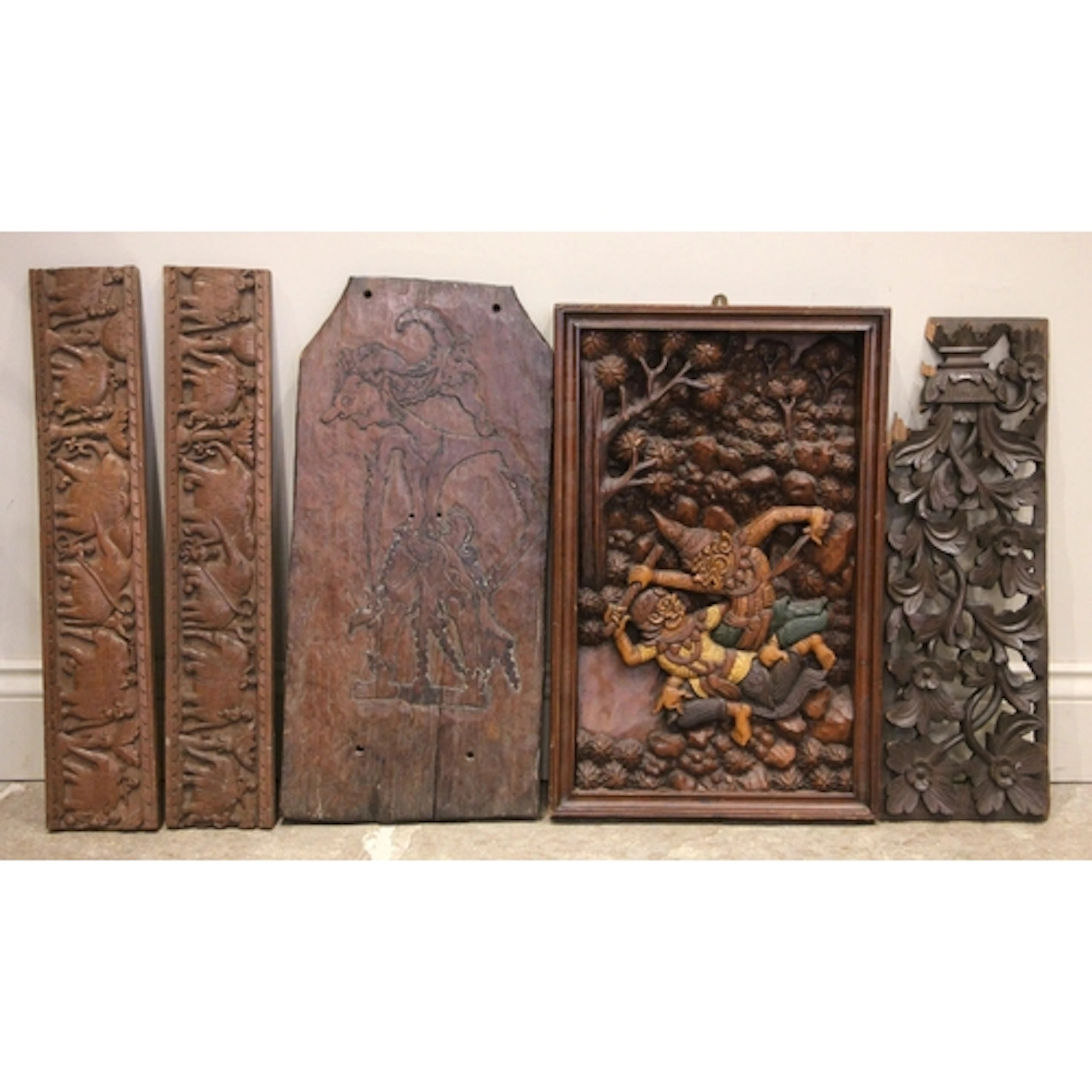 A collection of carved hardwood panels, 19th century and lat...