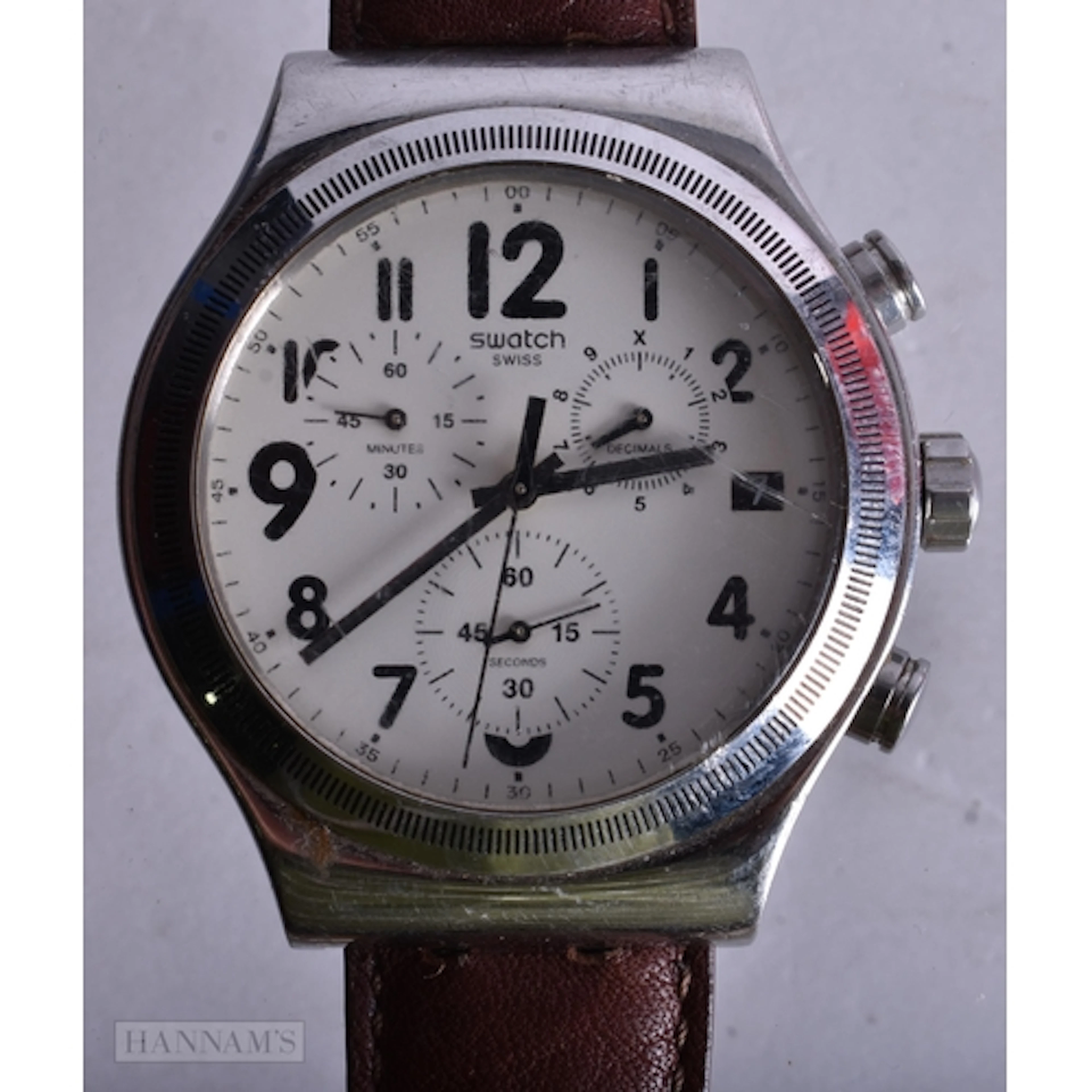 A SWATCH WRISTWATCH. Running. 4.5 cm wide.