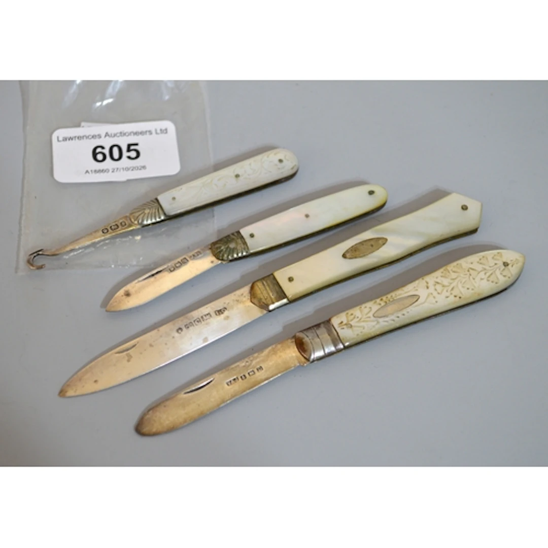 Three silver bladed mother of pearl handled fruit knives, to...