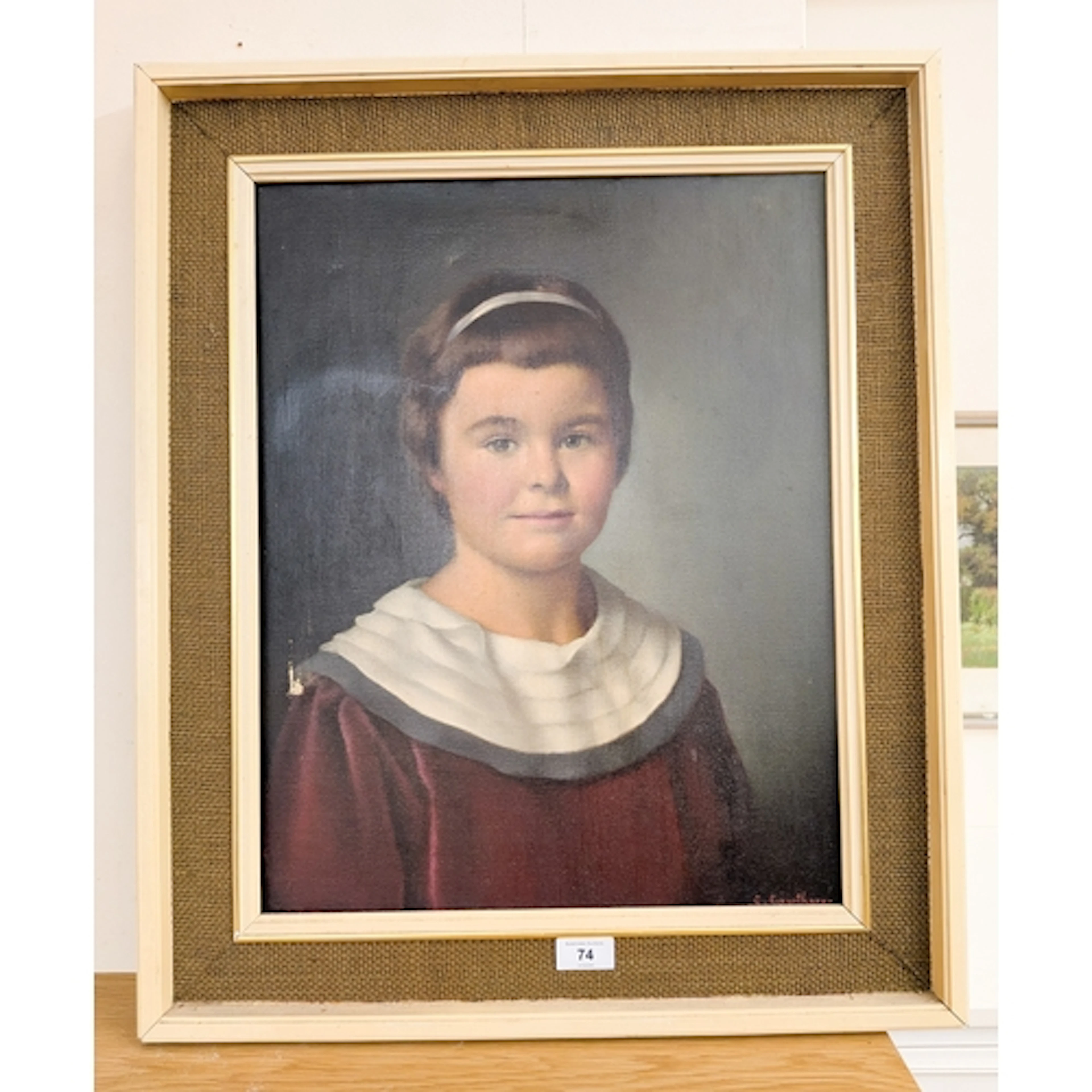 Oil on canvas half length portrait of a young girl