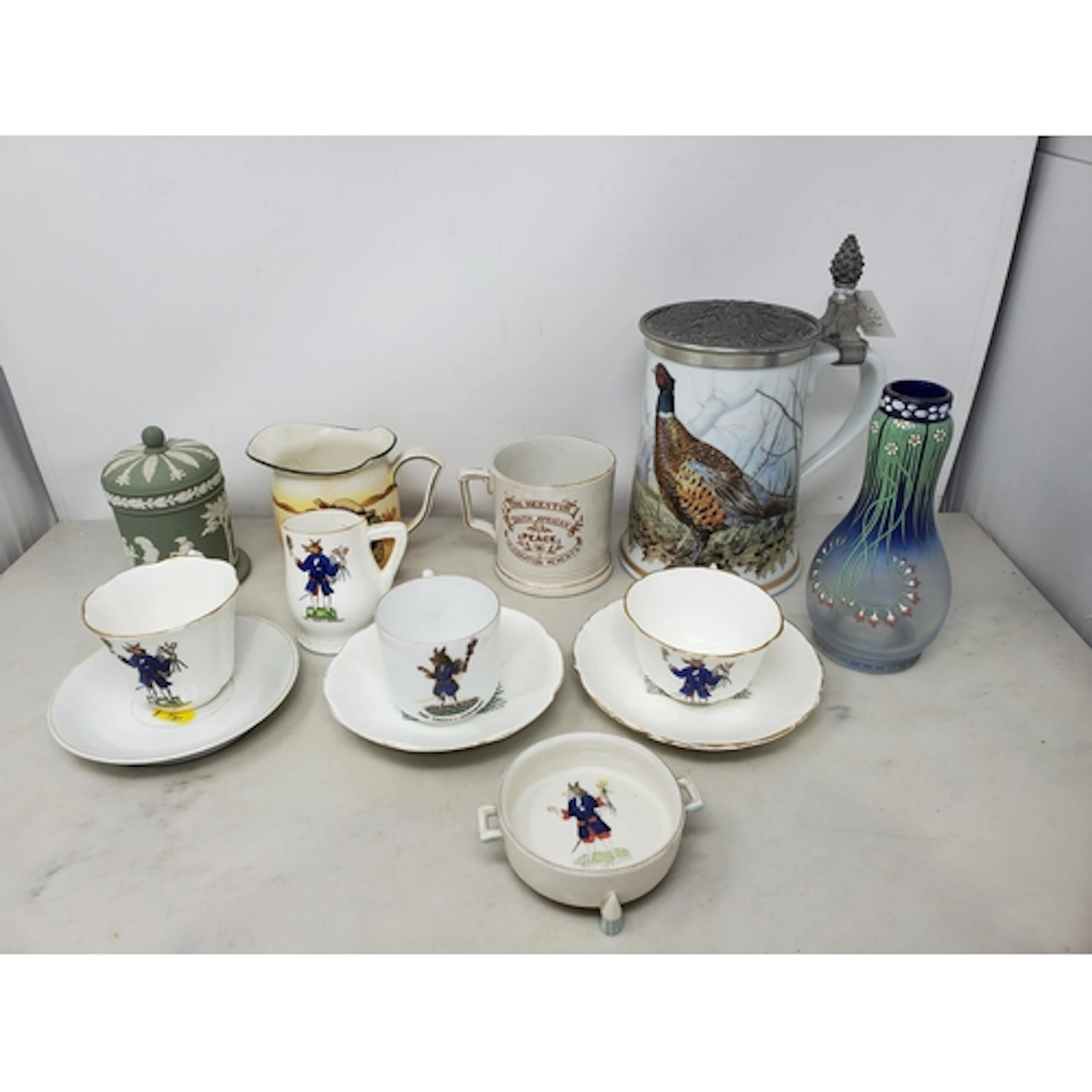 A Franklin porcelain Game Bird Stein, a Trusty Servant part ...