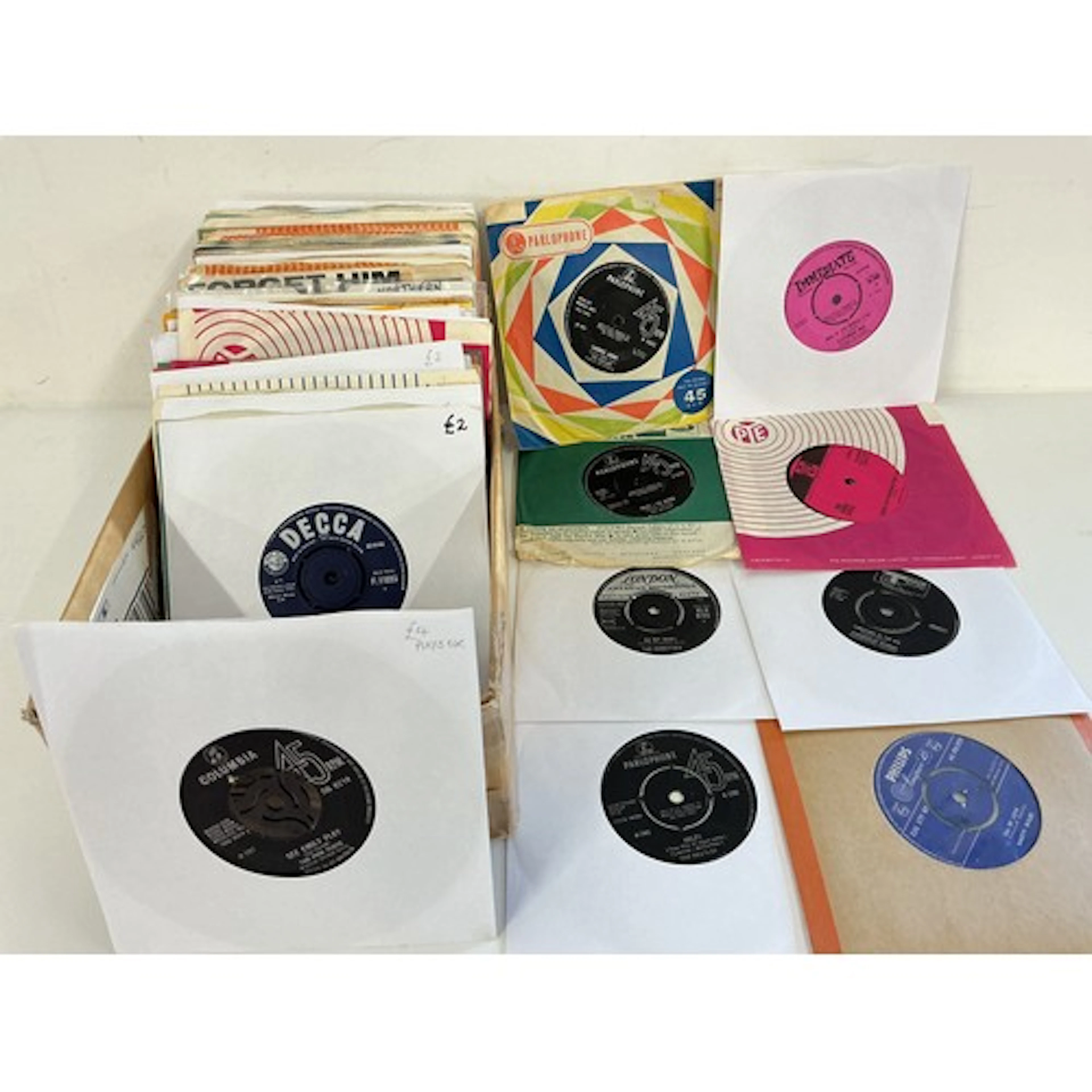 A box of 1960s 7” singles and EPs by various artists includi...