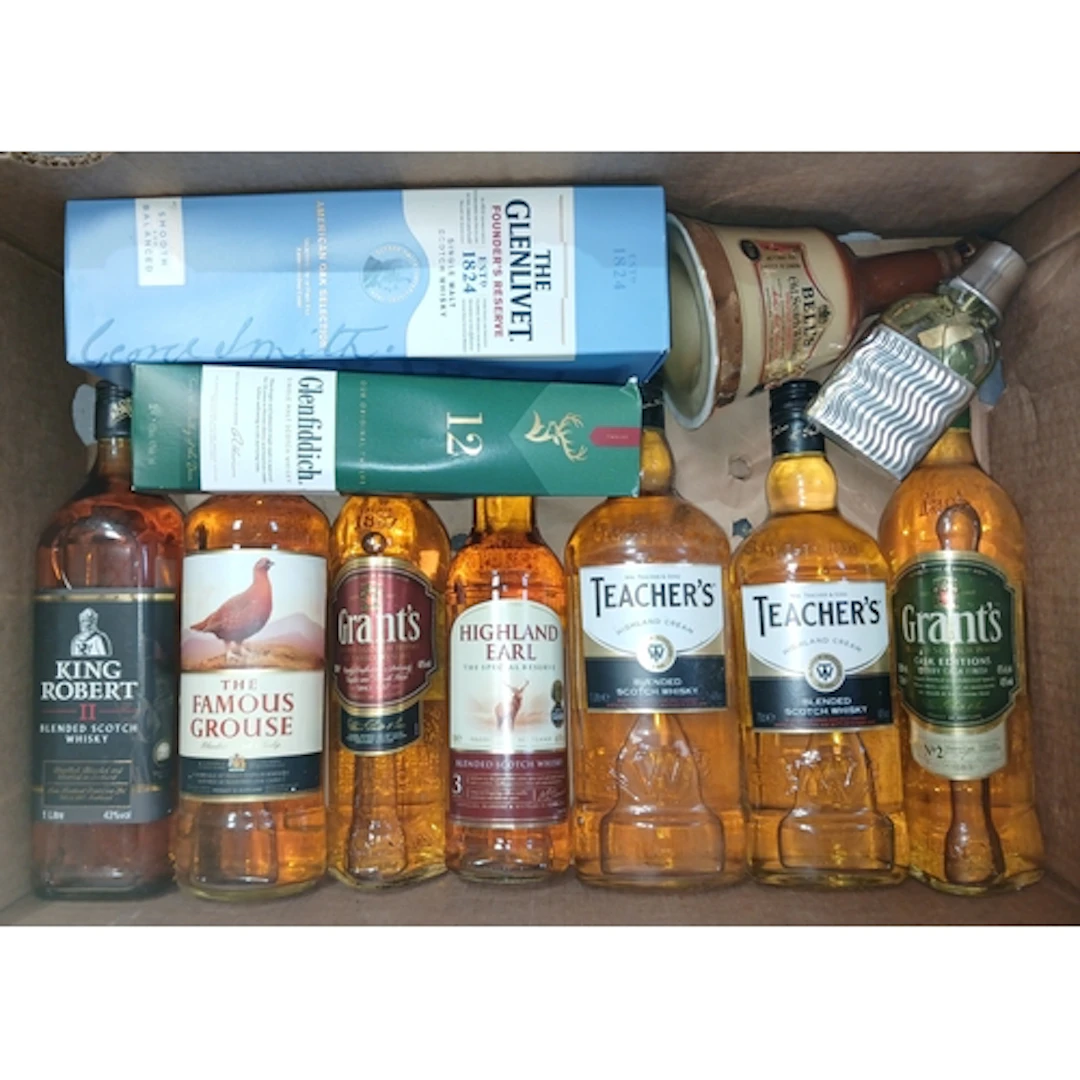 Eight bottles of assorted blended scotch whisky and two sing...