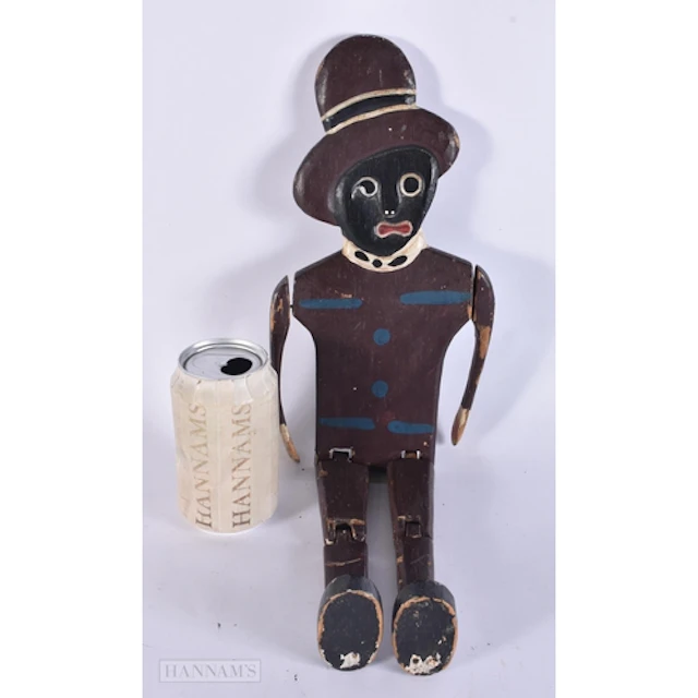 AN UNUSUAL EARLY 20TH CENTURY PAINTED WOOD FOLK ART WHIRLIGI...