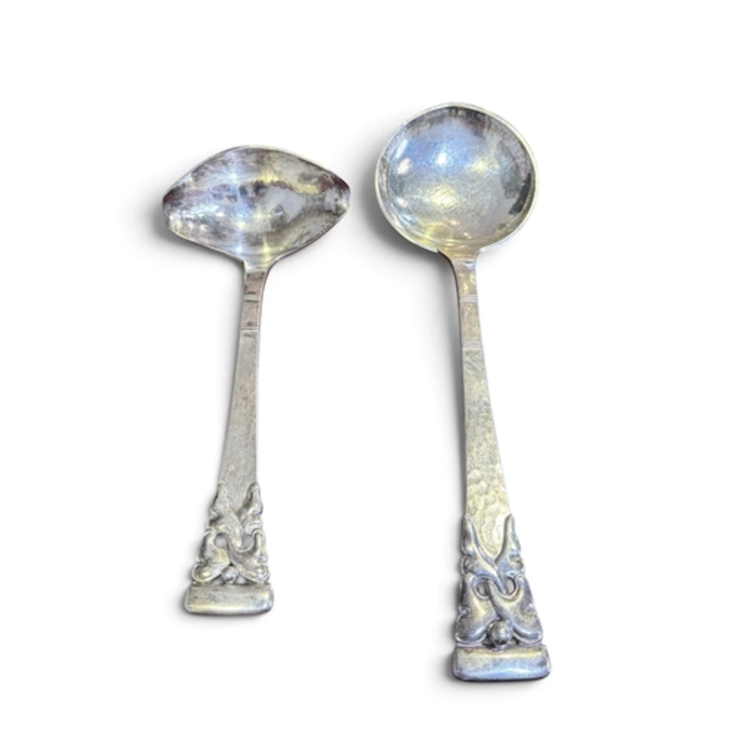 A DANISH SILVER SERVING SPOON AND SIDE POURING LADLE, COPENH...