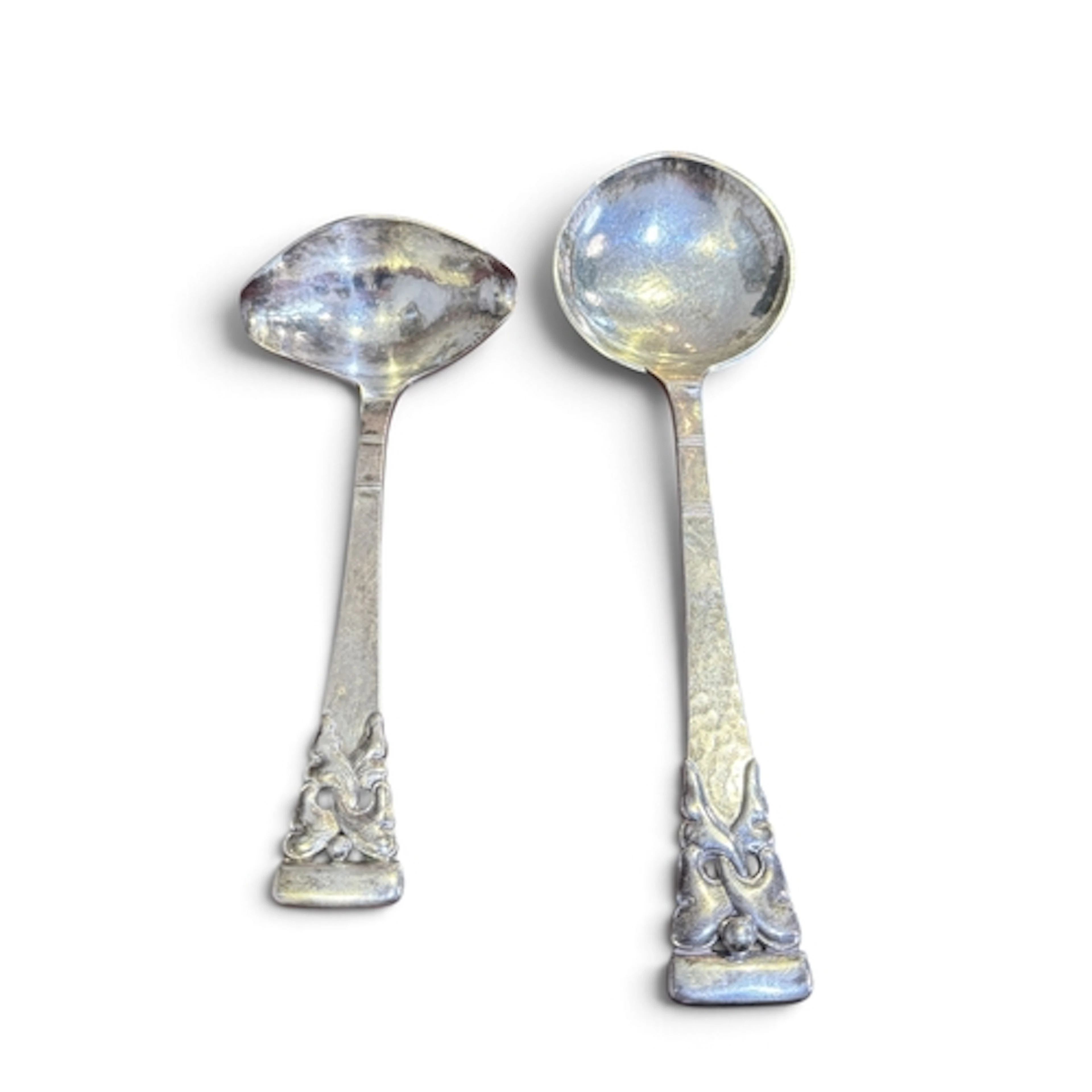 A DANISH SILVER SERVING SPOON AND SIDE POURING LADLE, COPENH...