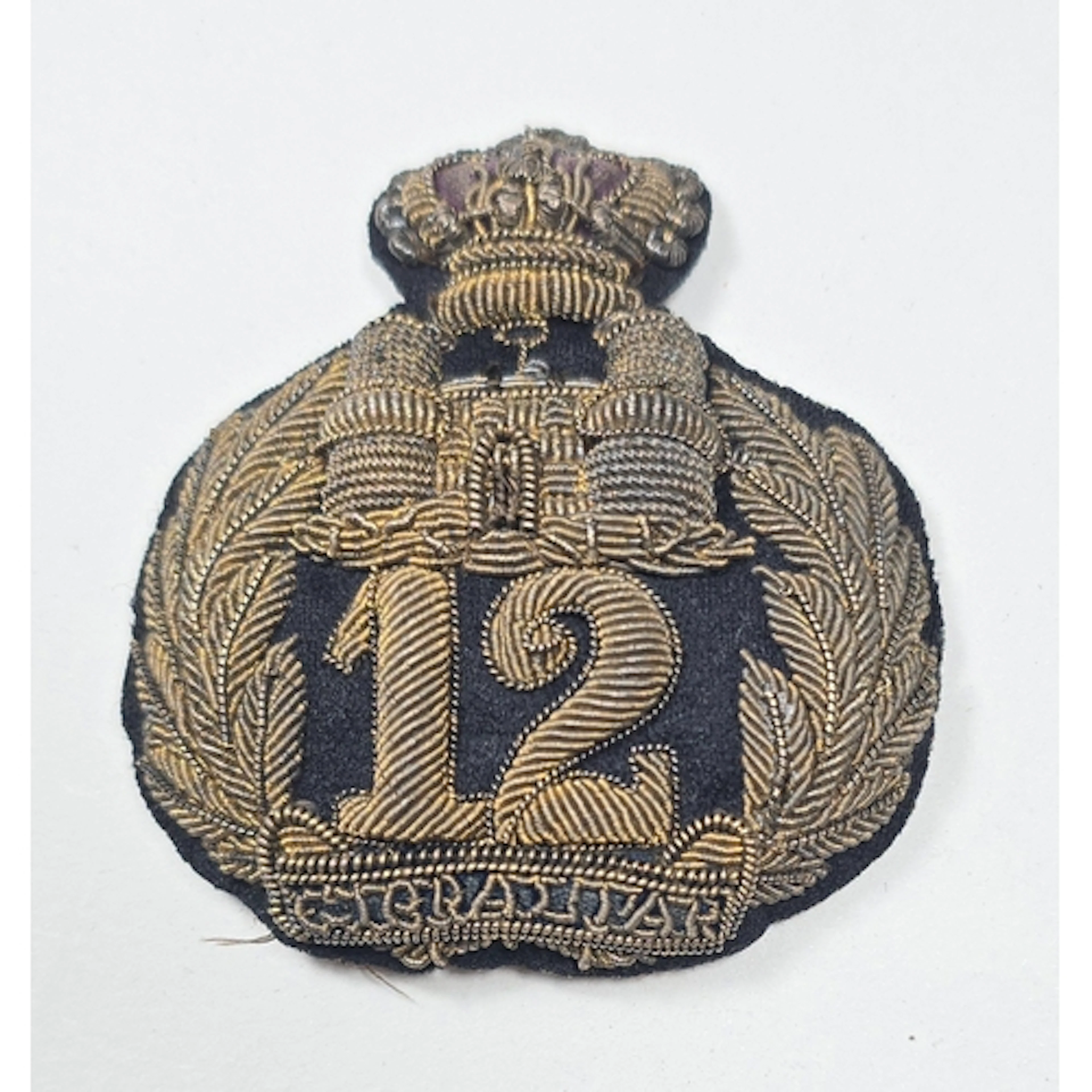 12th (East Suffolk) Regiment. An officer’s forage cap badge ...