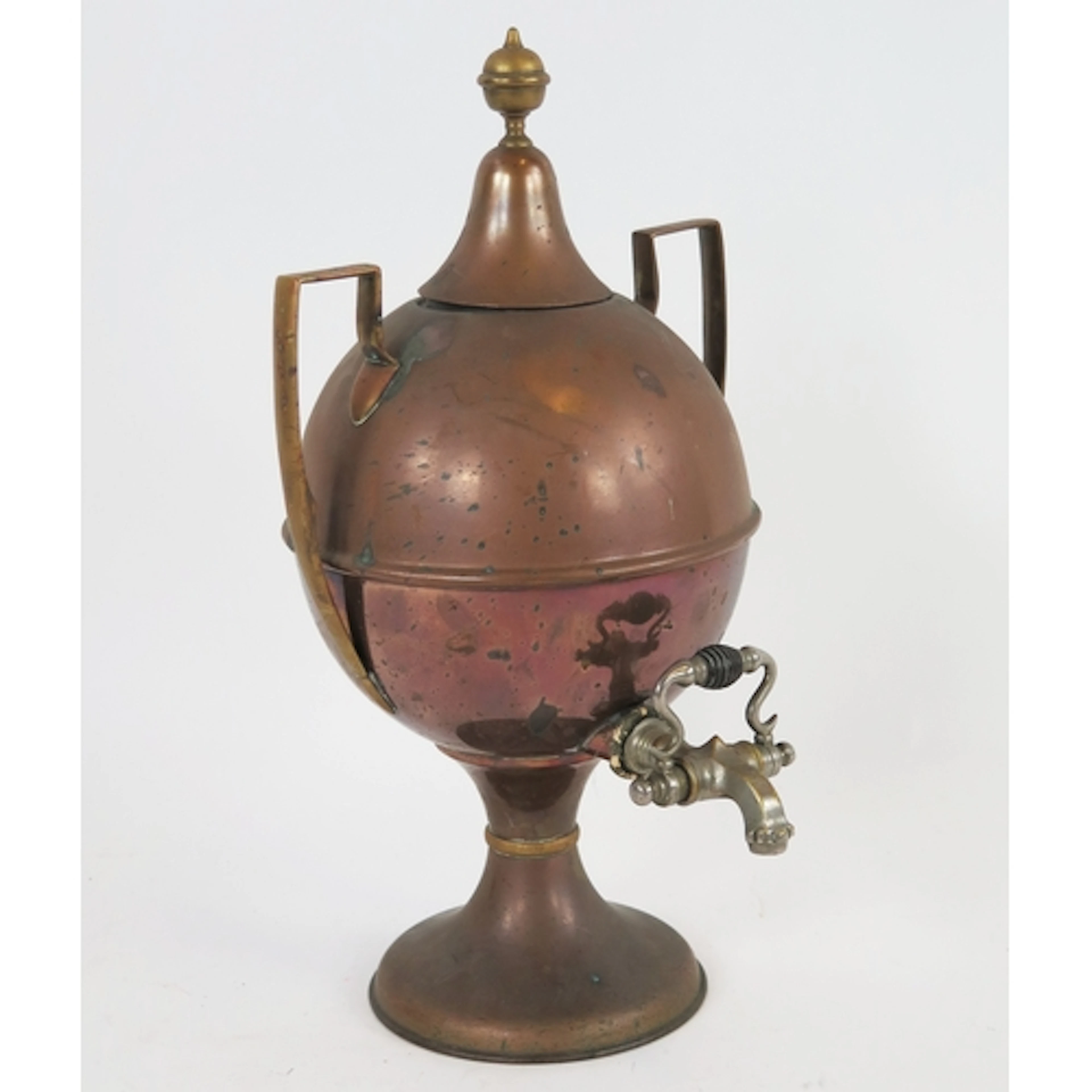 A copper samovar, of traditional form with brass finial, 43c...