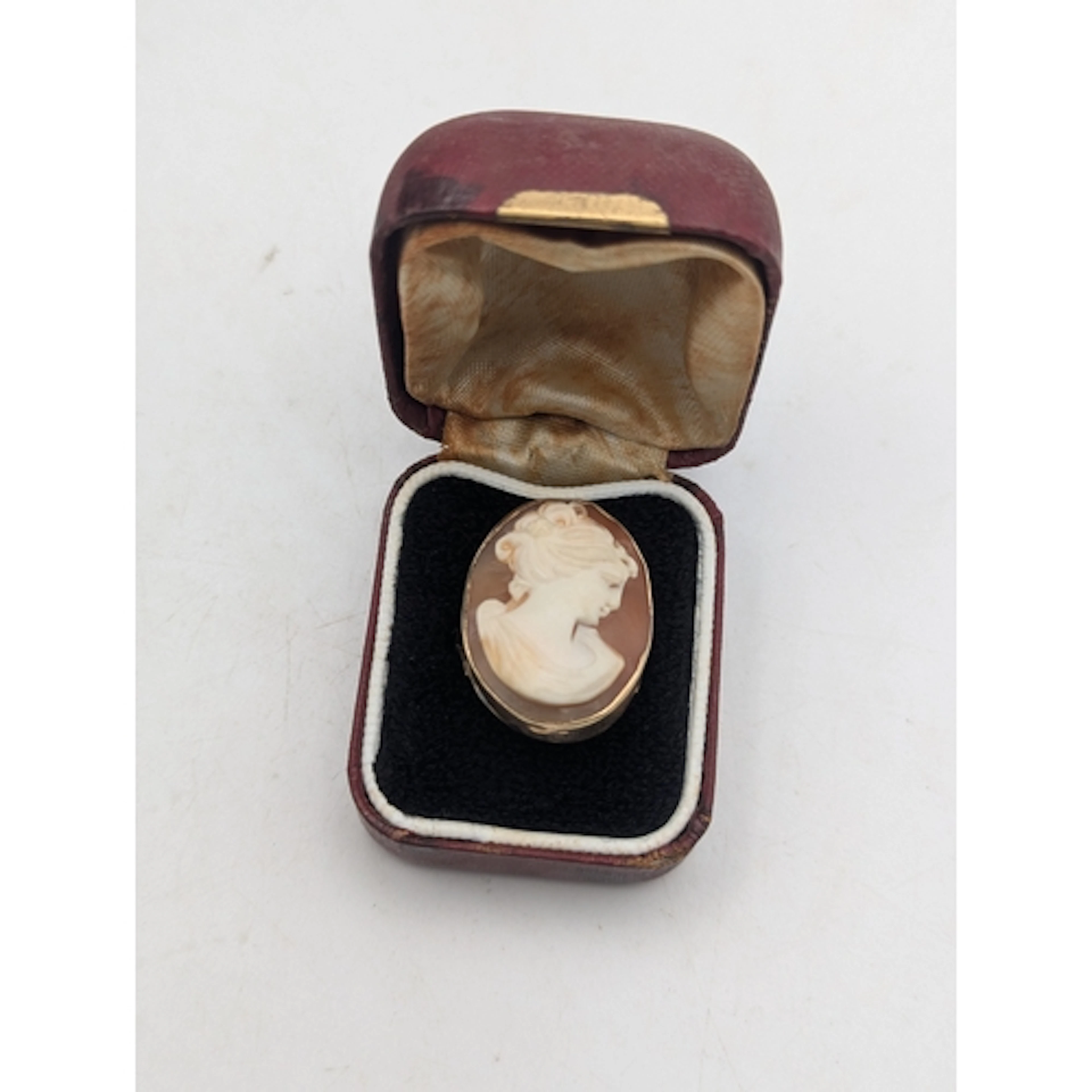 A cameo mounted in a 9ct yellow gold ring, stamped 375 with ...