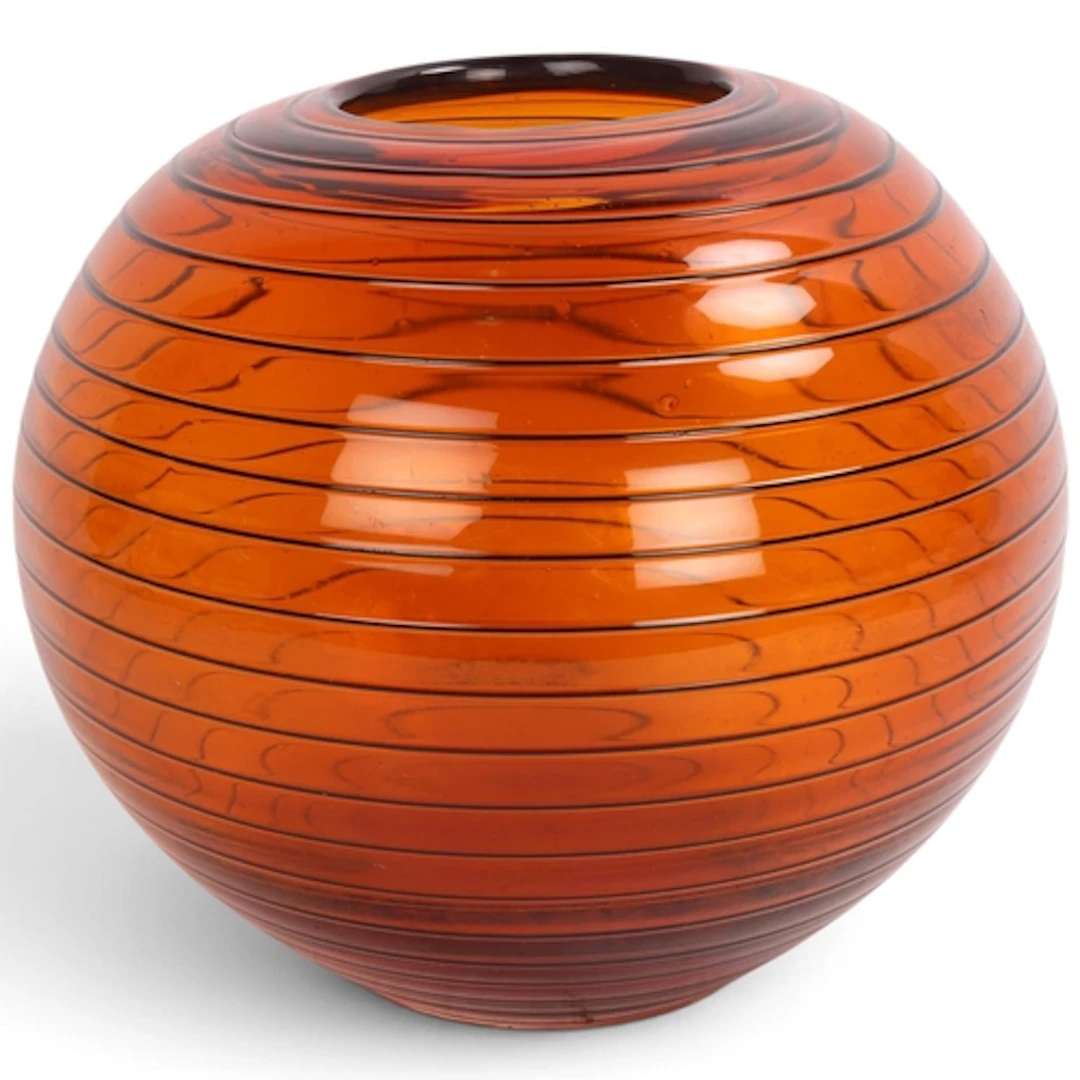 A hand blown amber glass globe vase with black glass banding...