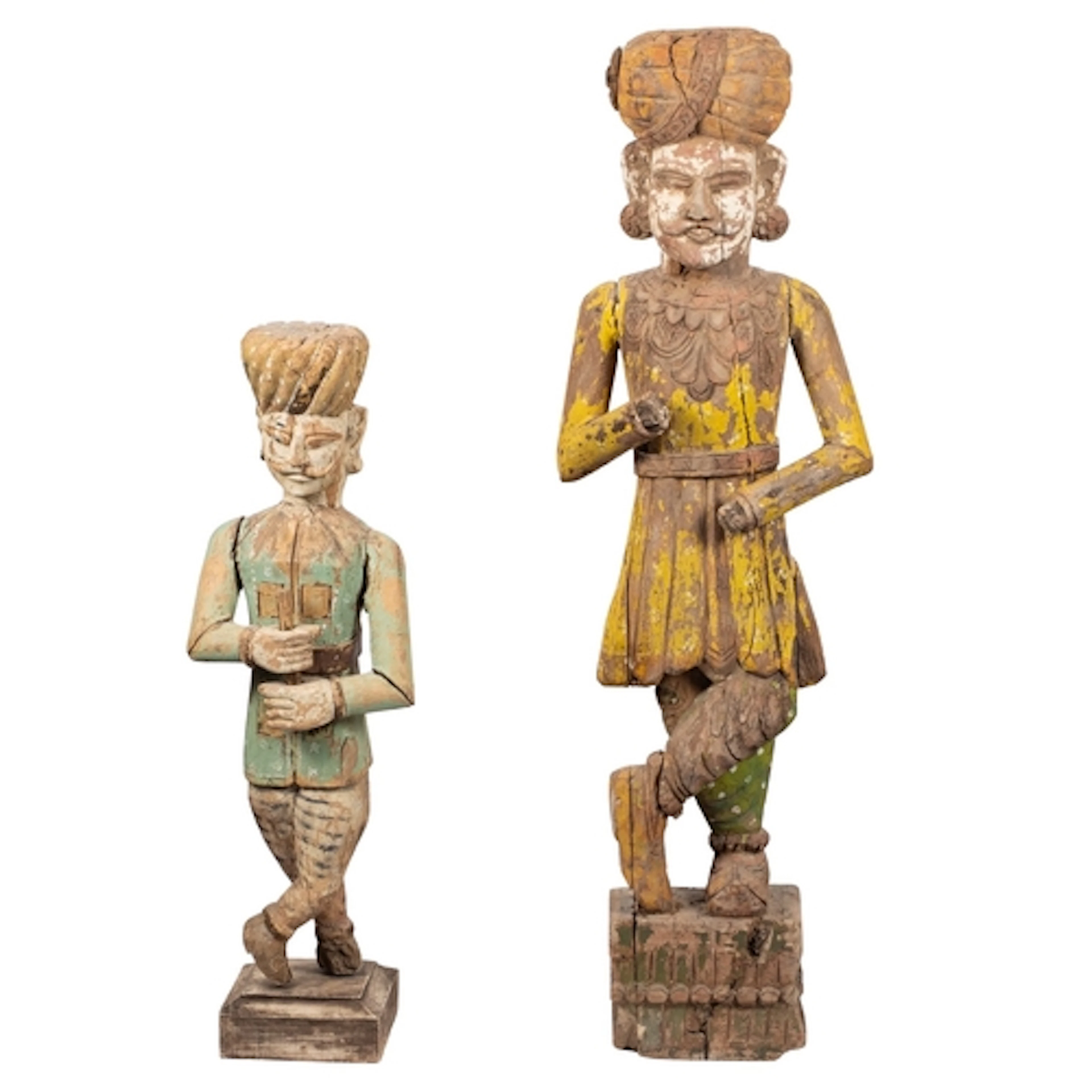 A large Indian carved and painted wood Guardian figure, 20th...