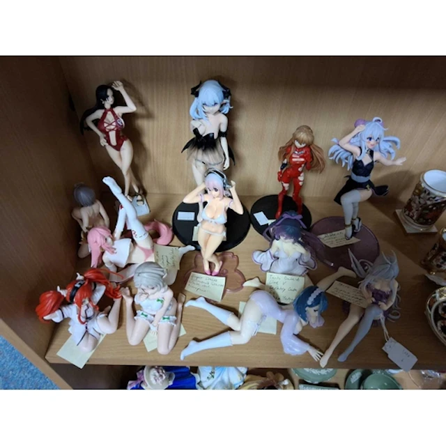 GROUP OF TWELVE PVC ANIME FIGURES to include Yae Miko Gensin...
