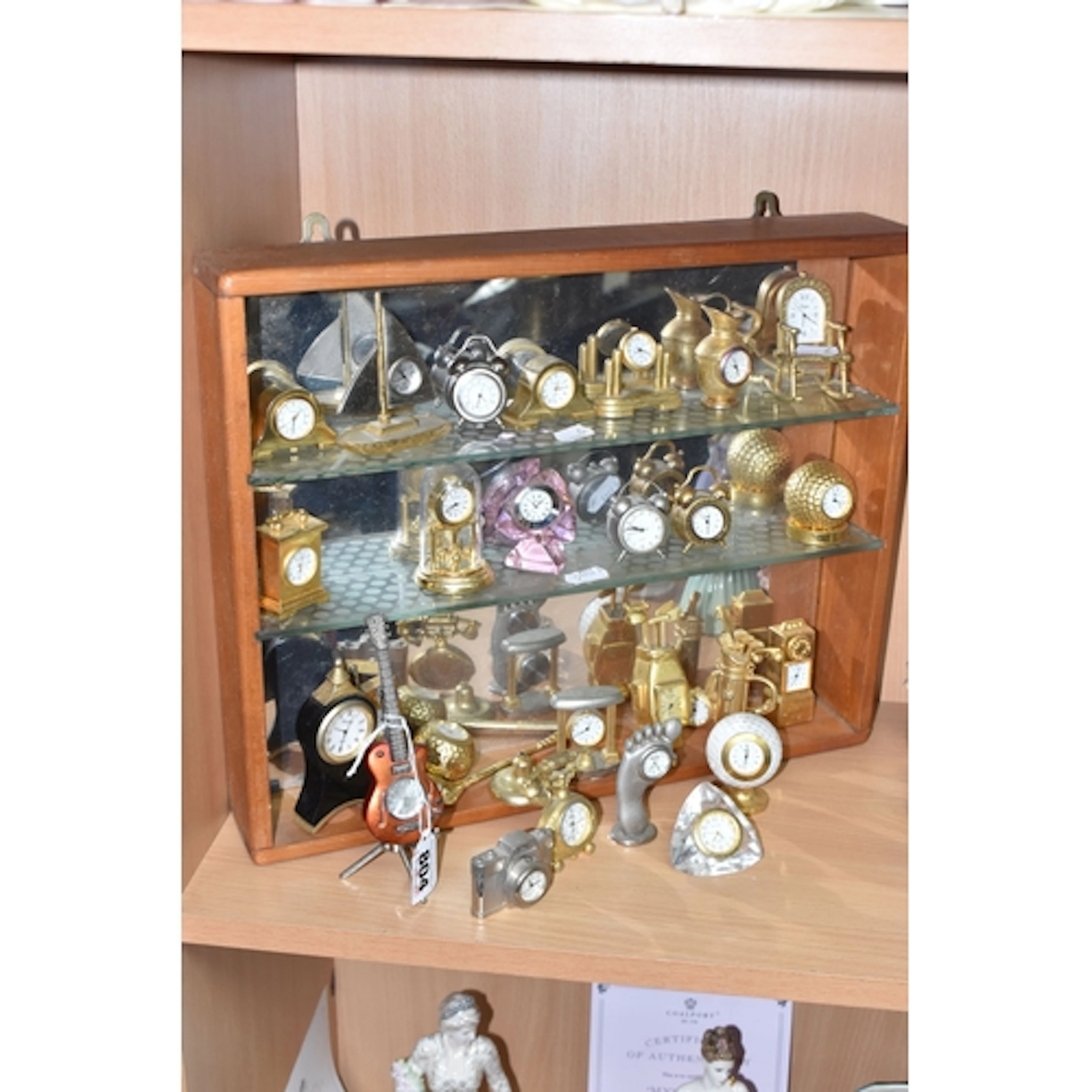 A COLLECTION OF MINIATURE NOVELTY CLOCKS, twenty six clocks ...