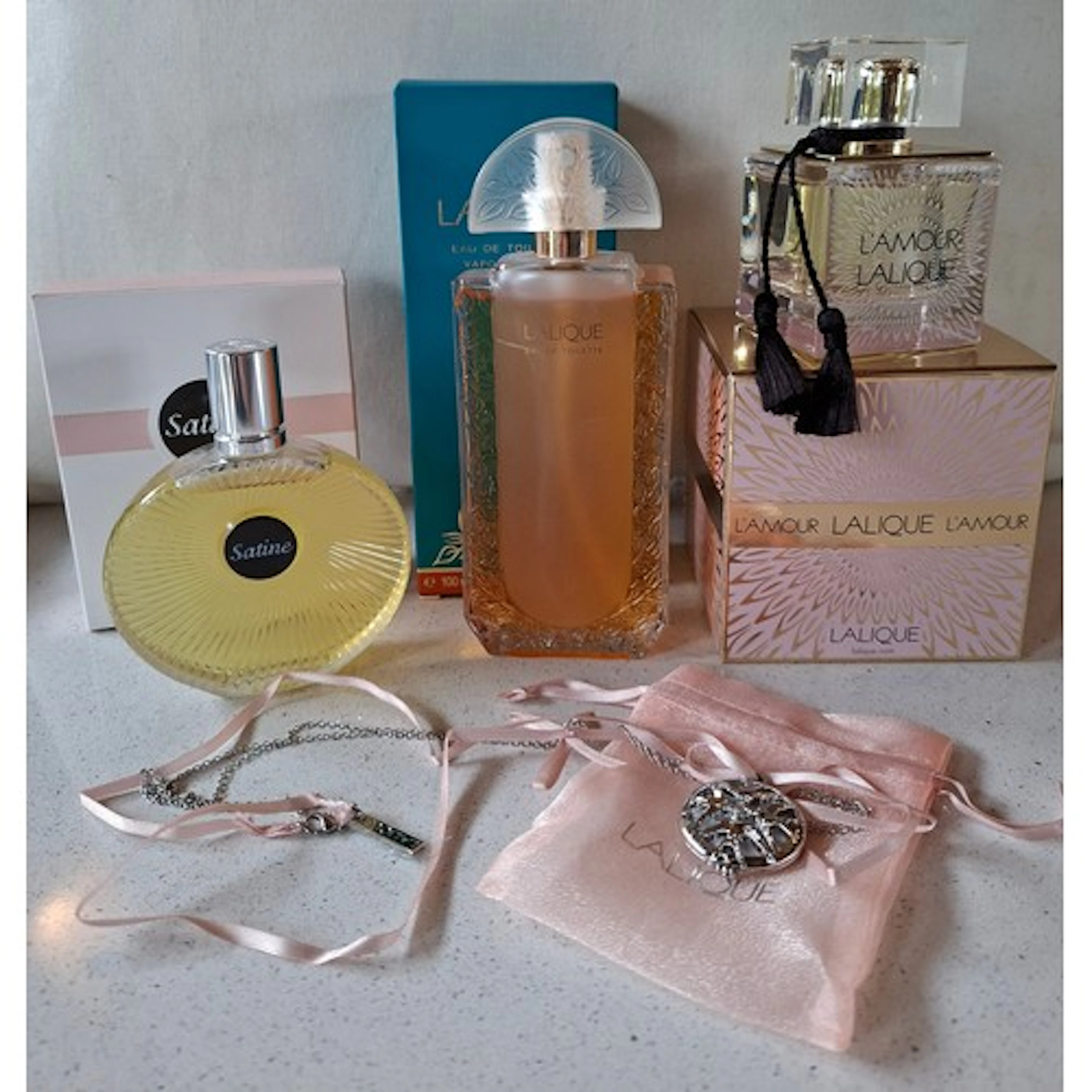 Lalique- Three fragrances comprising 'L'Amour' together with...