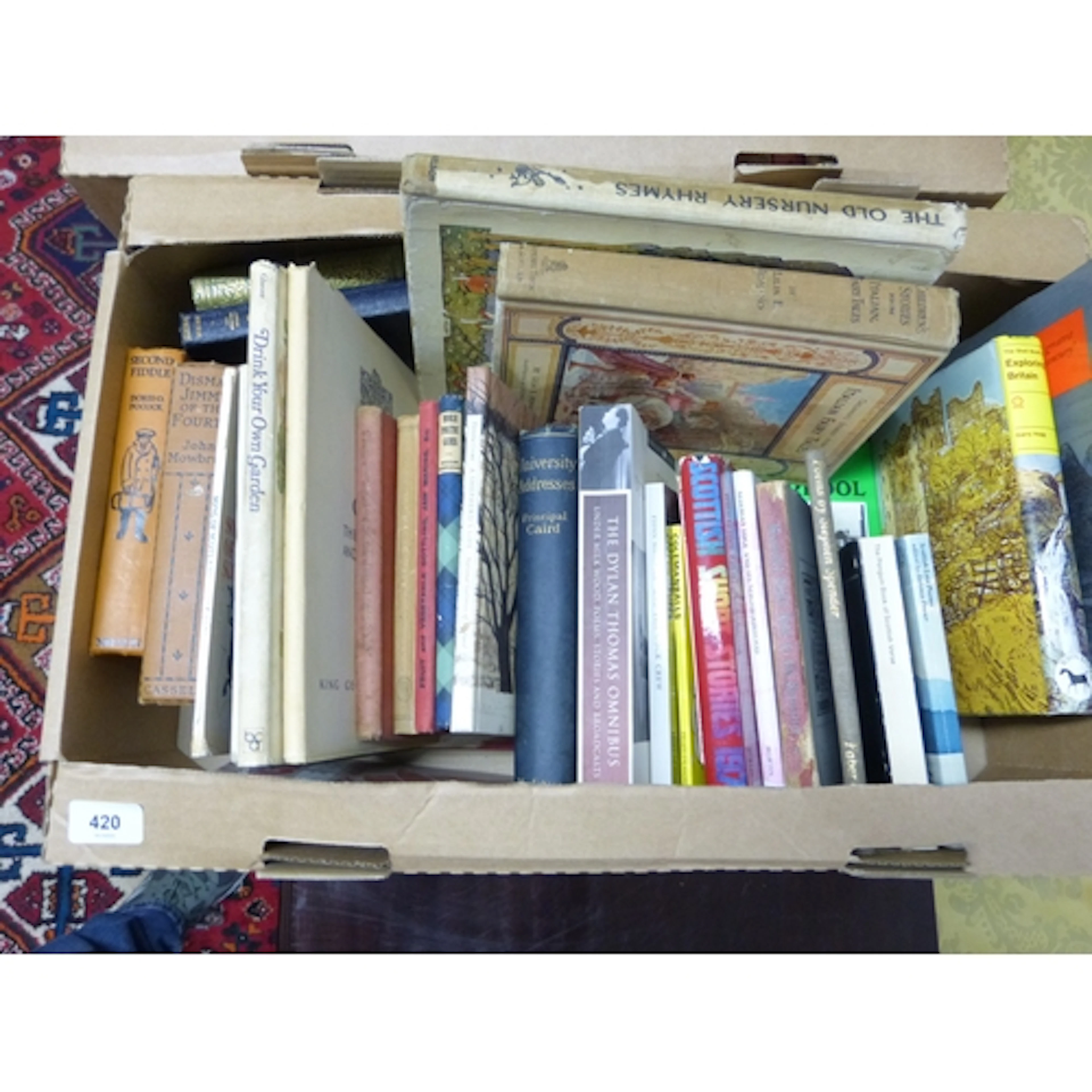 Two boxes of modern and vintage books.