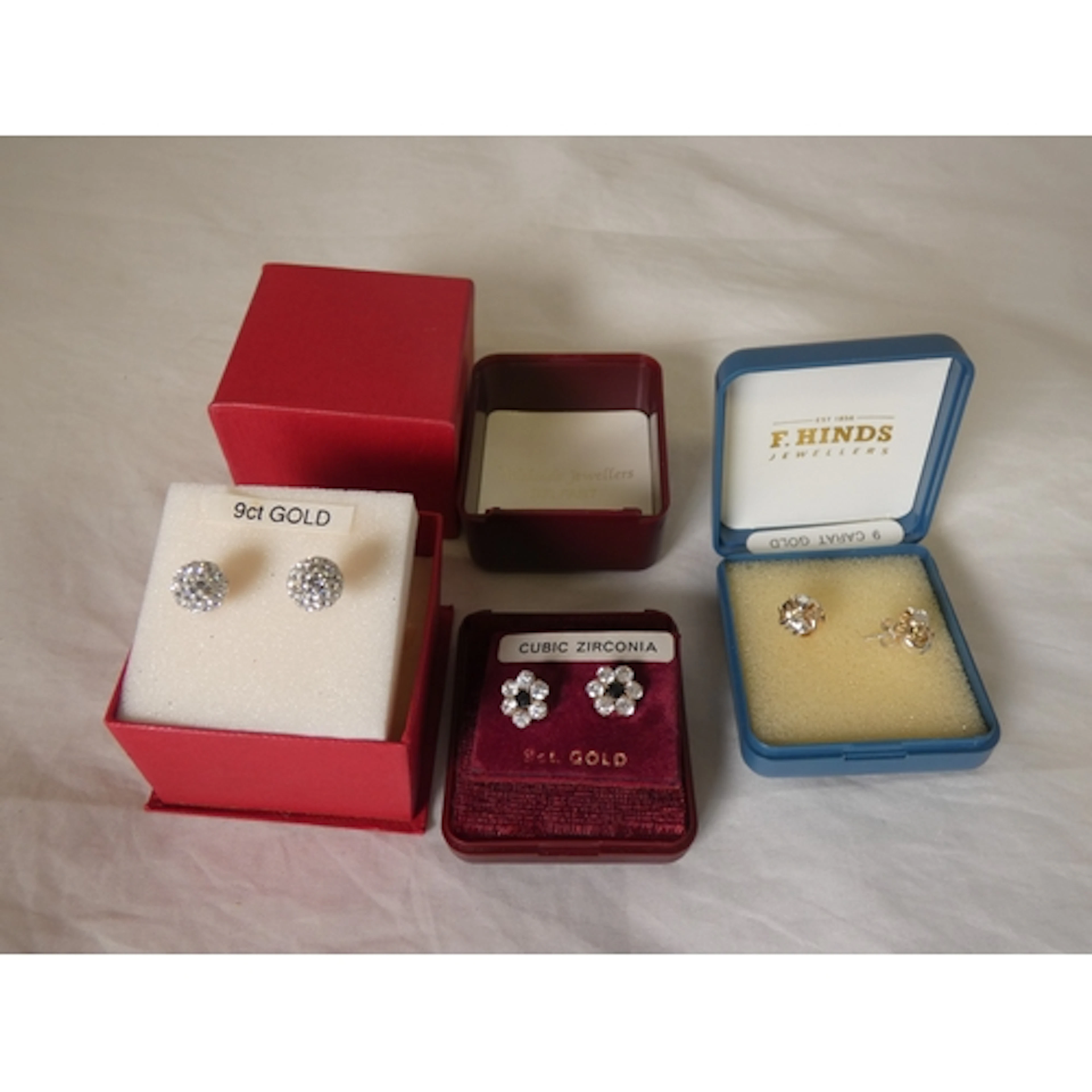 Three pairs of ladies' earrings to include cubic zirconia ex...