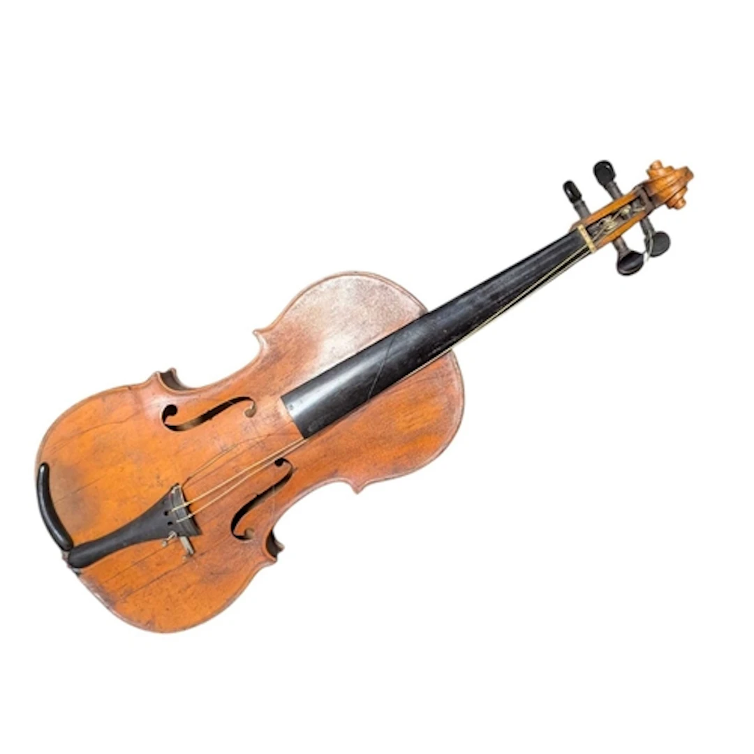 A late 19th century mahogany violin with hard case. The viol...