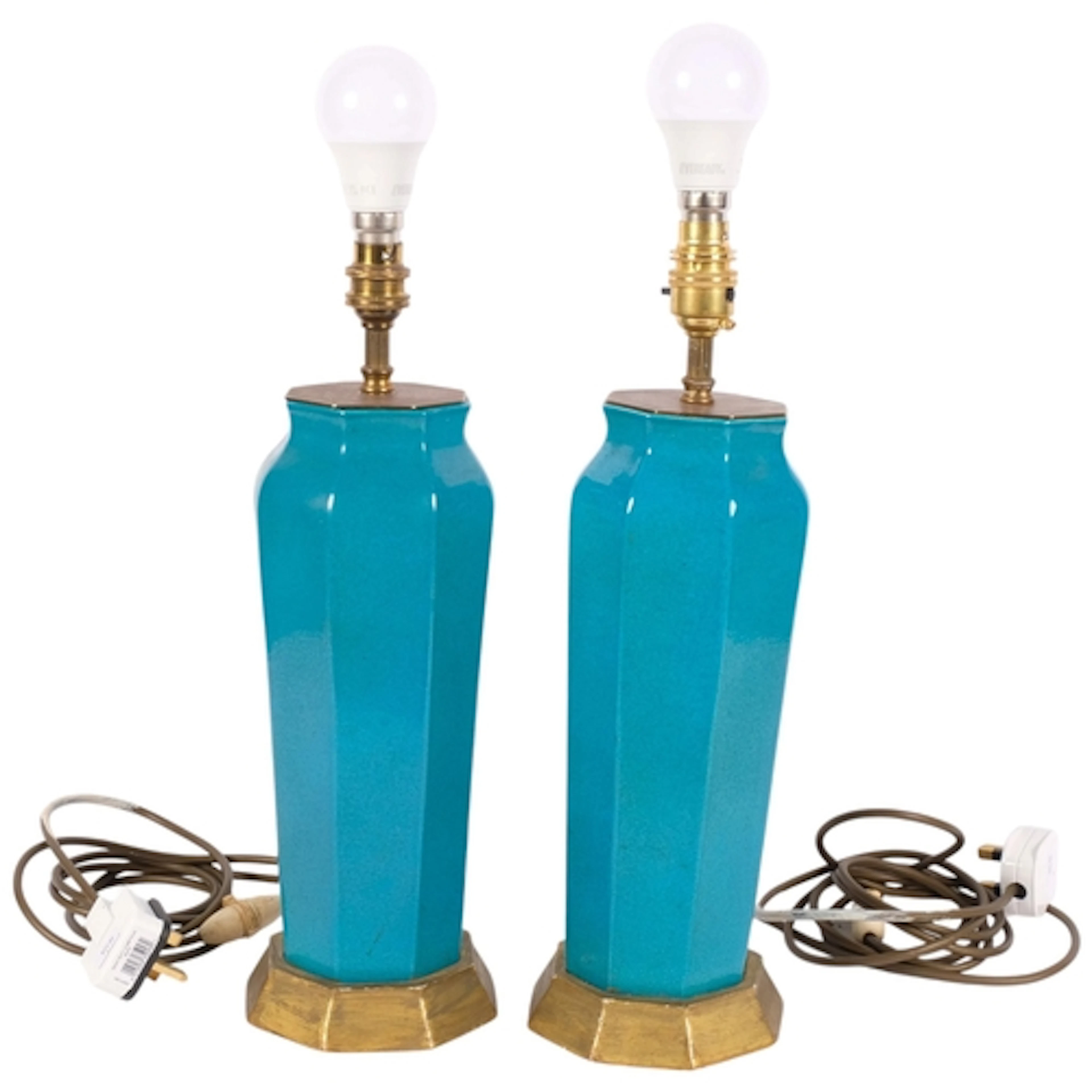 A pair of early 20th century turquoise glazed pottery table ...