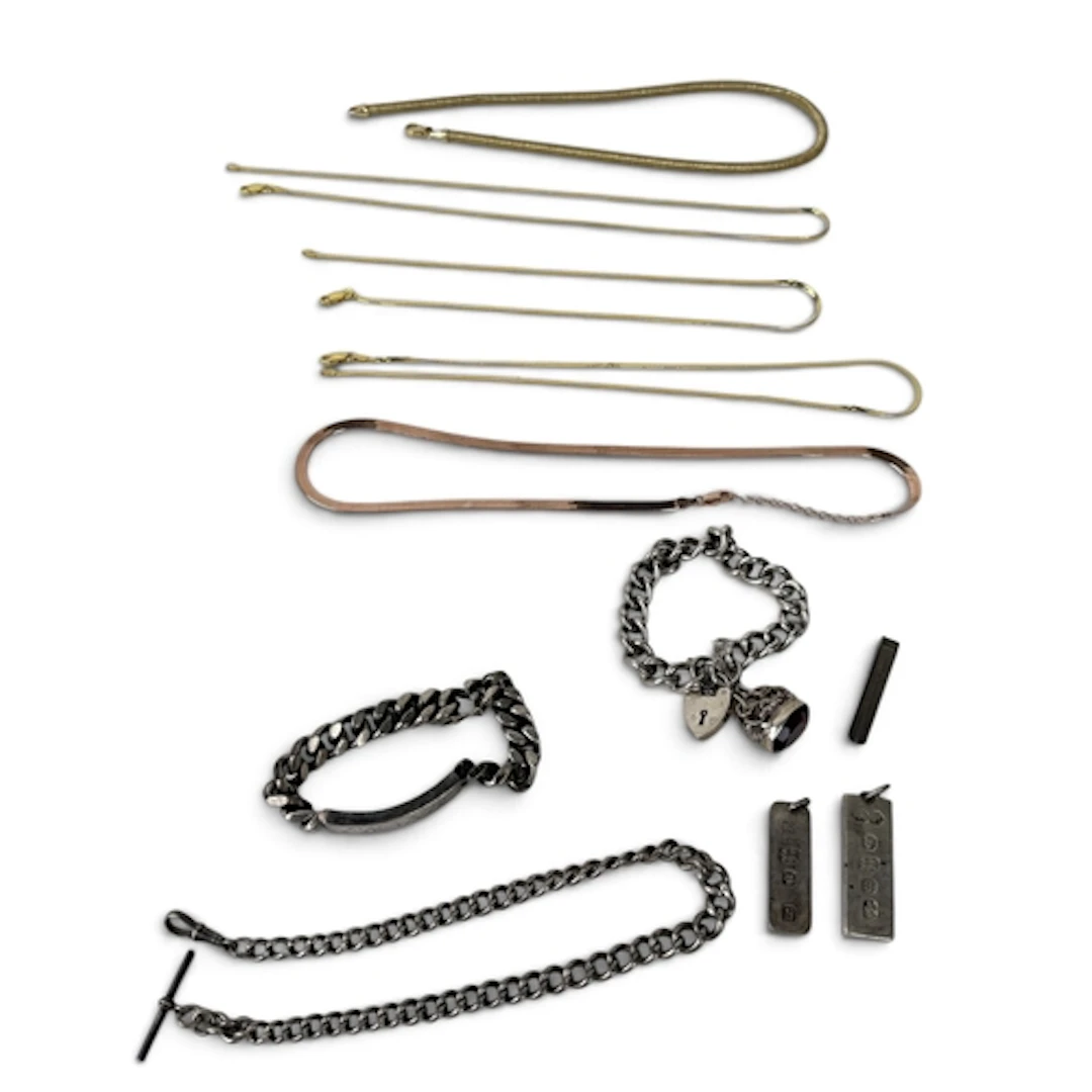 TWO SILVER CURB LINK BRACELETS Together with a silver Albert...