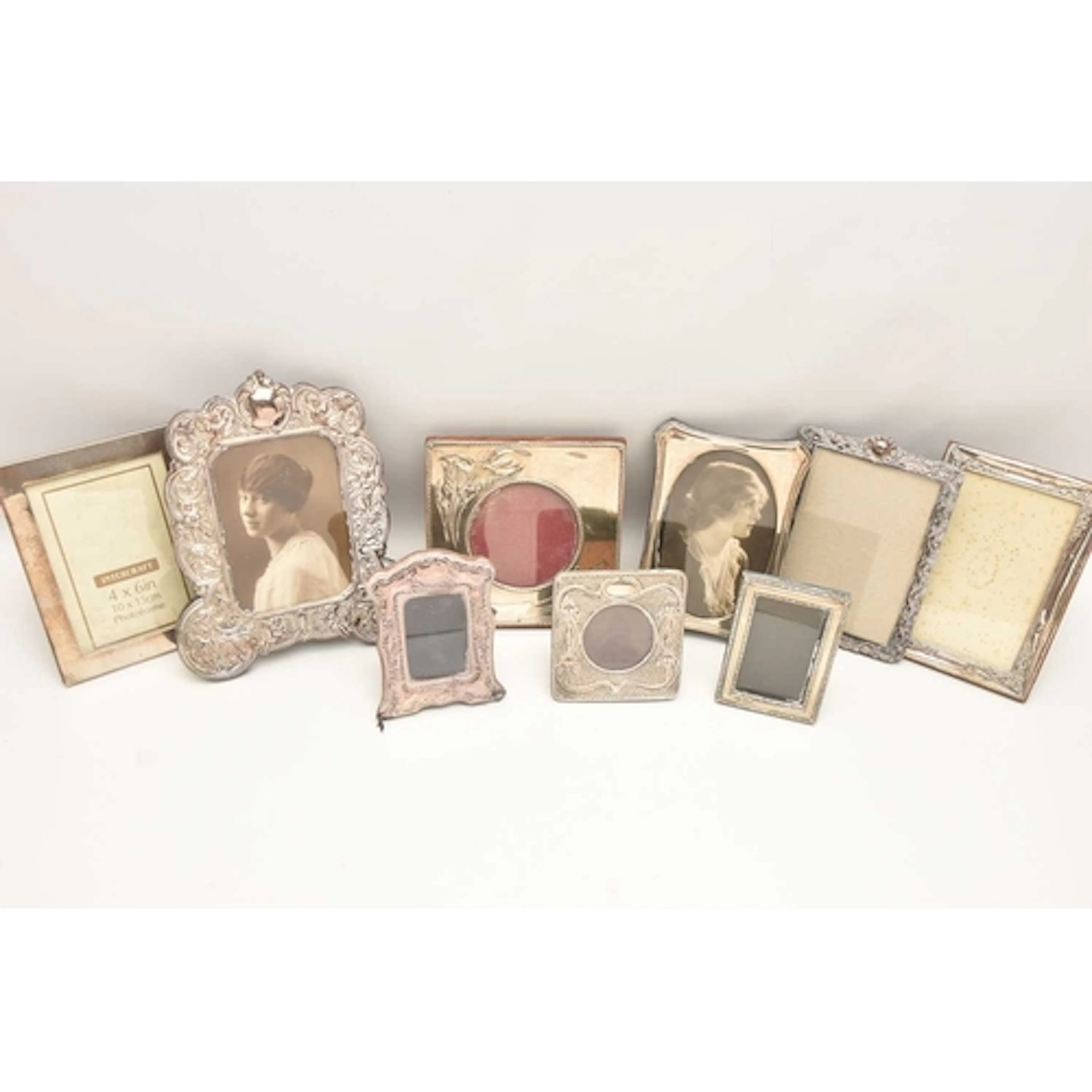 AN ASSORTMENT OF SILVER PHOTO FRAMES, early to mid 20th cent...