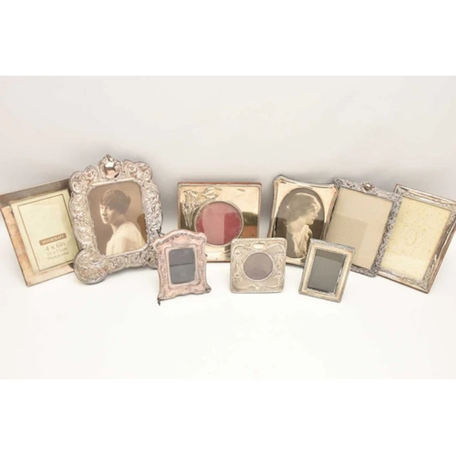 AN ASSORTMENT OF SILVER PHOTO FRAMES, early to mid 20th cent...