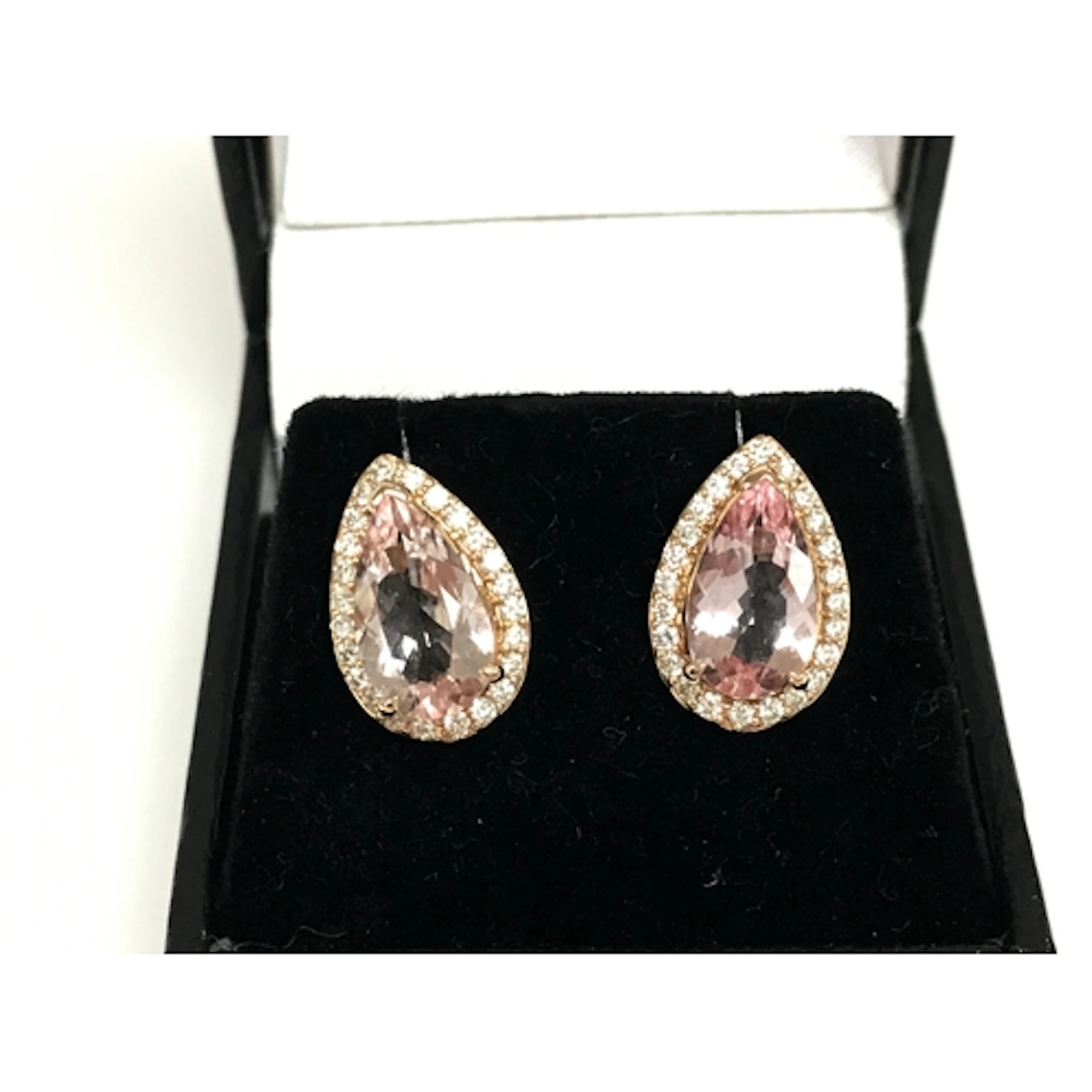 A pair of rose gold pear shaped morganite and diamond cluste...