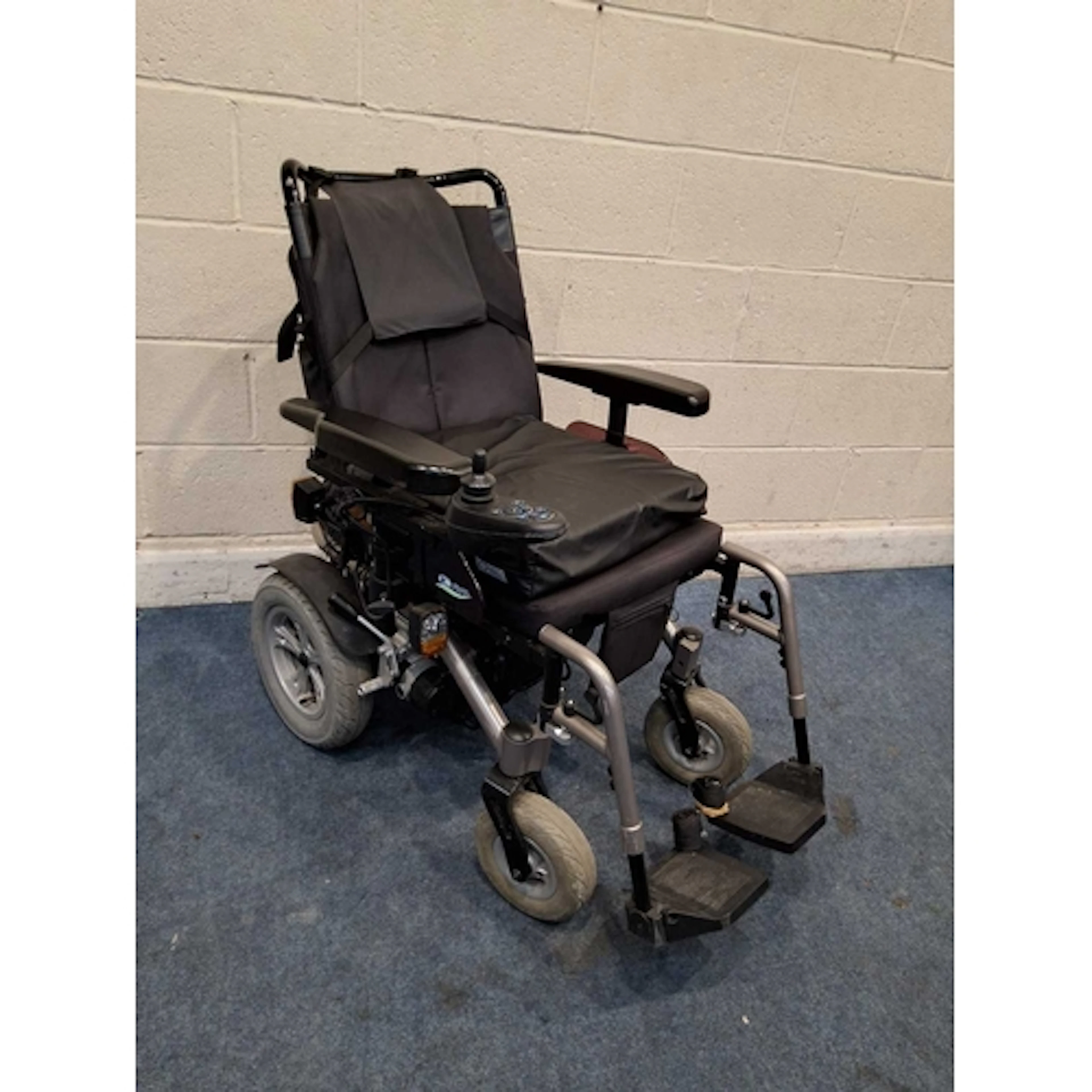 A KYMCO K-ACTIV ELECTRIC WHEELCHAIR with charger (PAT passed...