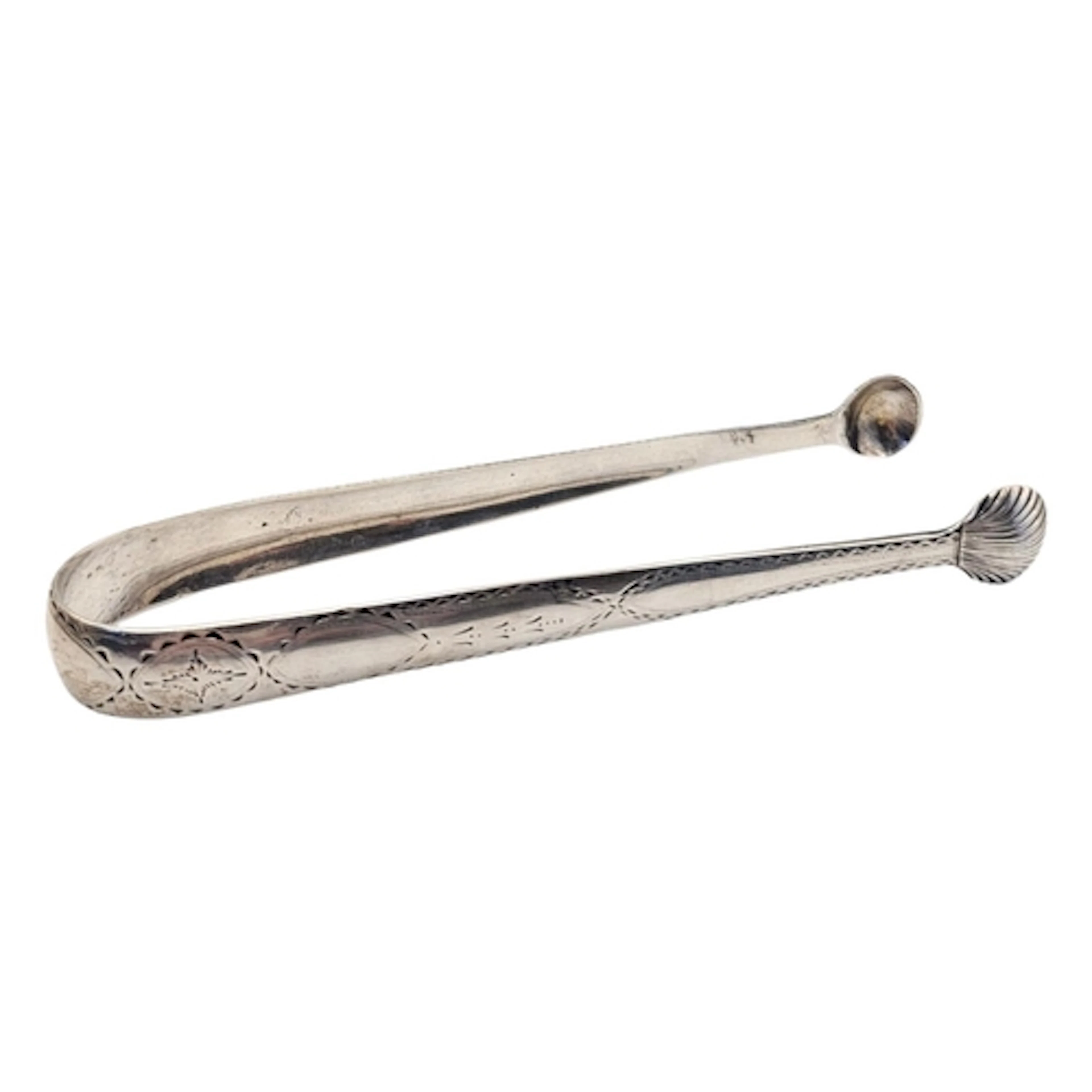 A PAIR OF GEORGIAN IRISH SILVER SUGAR TONGS Five classical ...