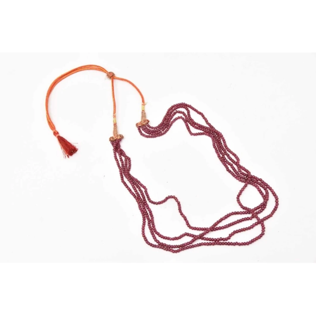 A RUBY BEADED NECKLACE, four row small beaded necklace on a ...