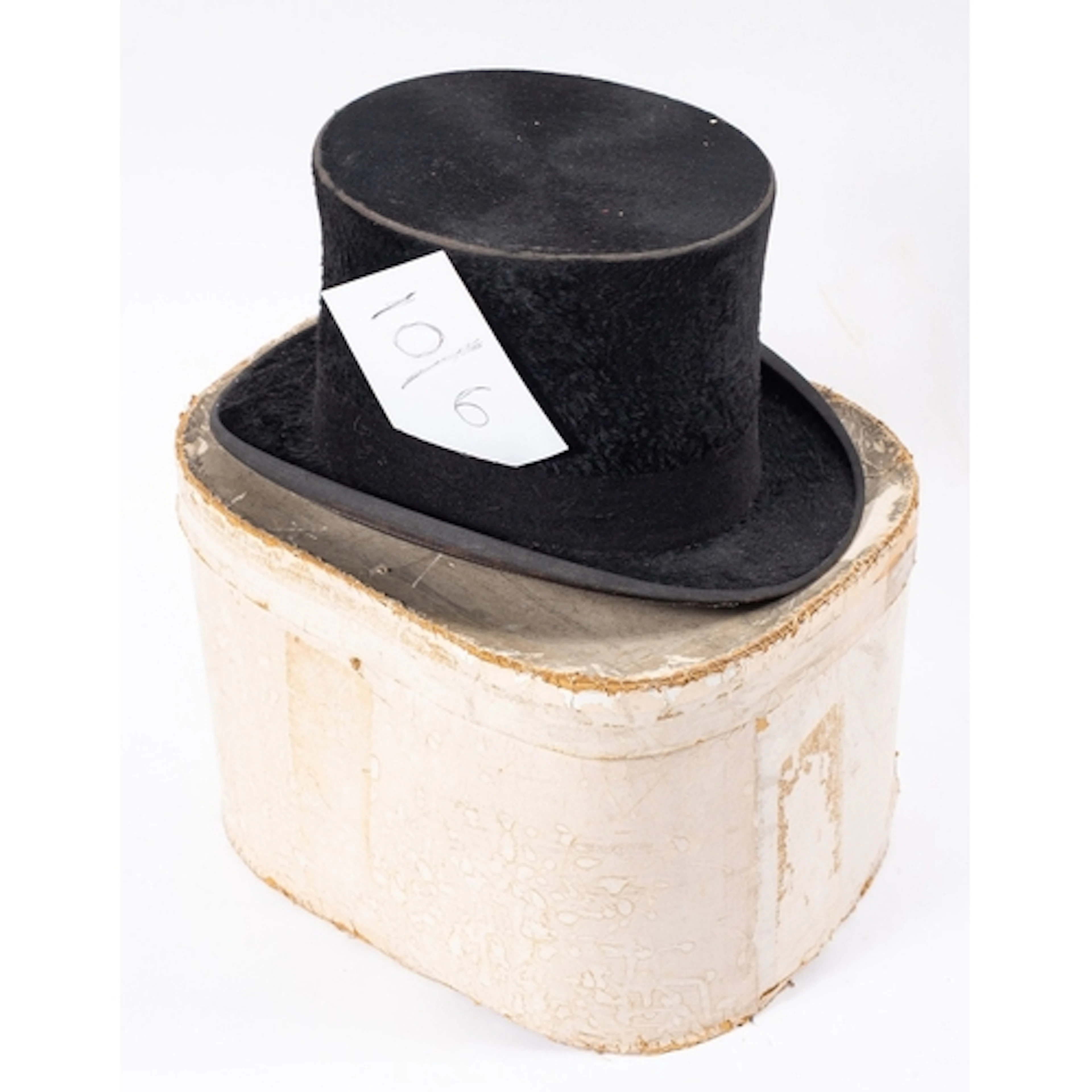 An early 20th Century Garrard Hats for Austin Reed black top...