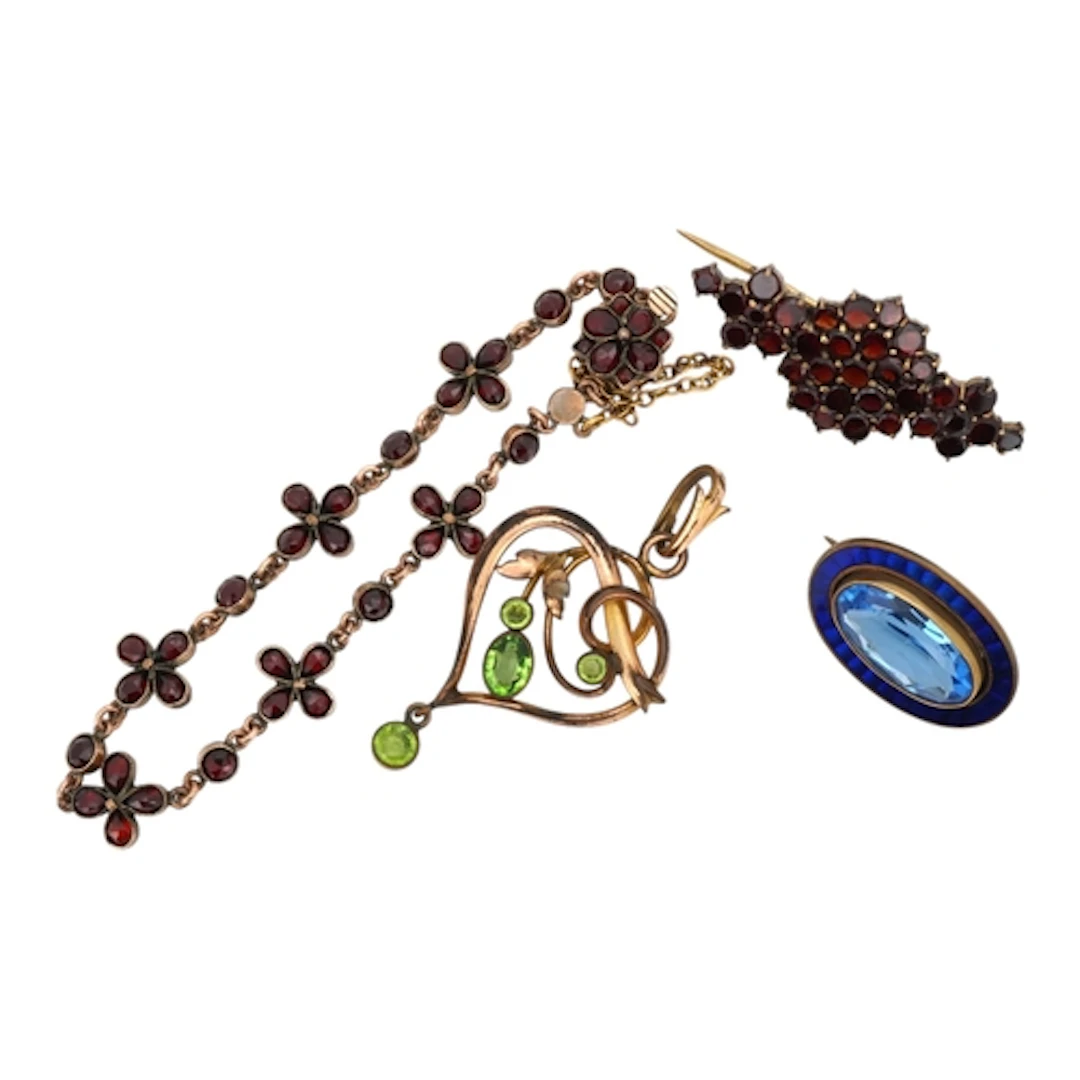 A Bohemian gilt metal and garnet cluster set bracelet, stamp...