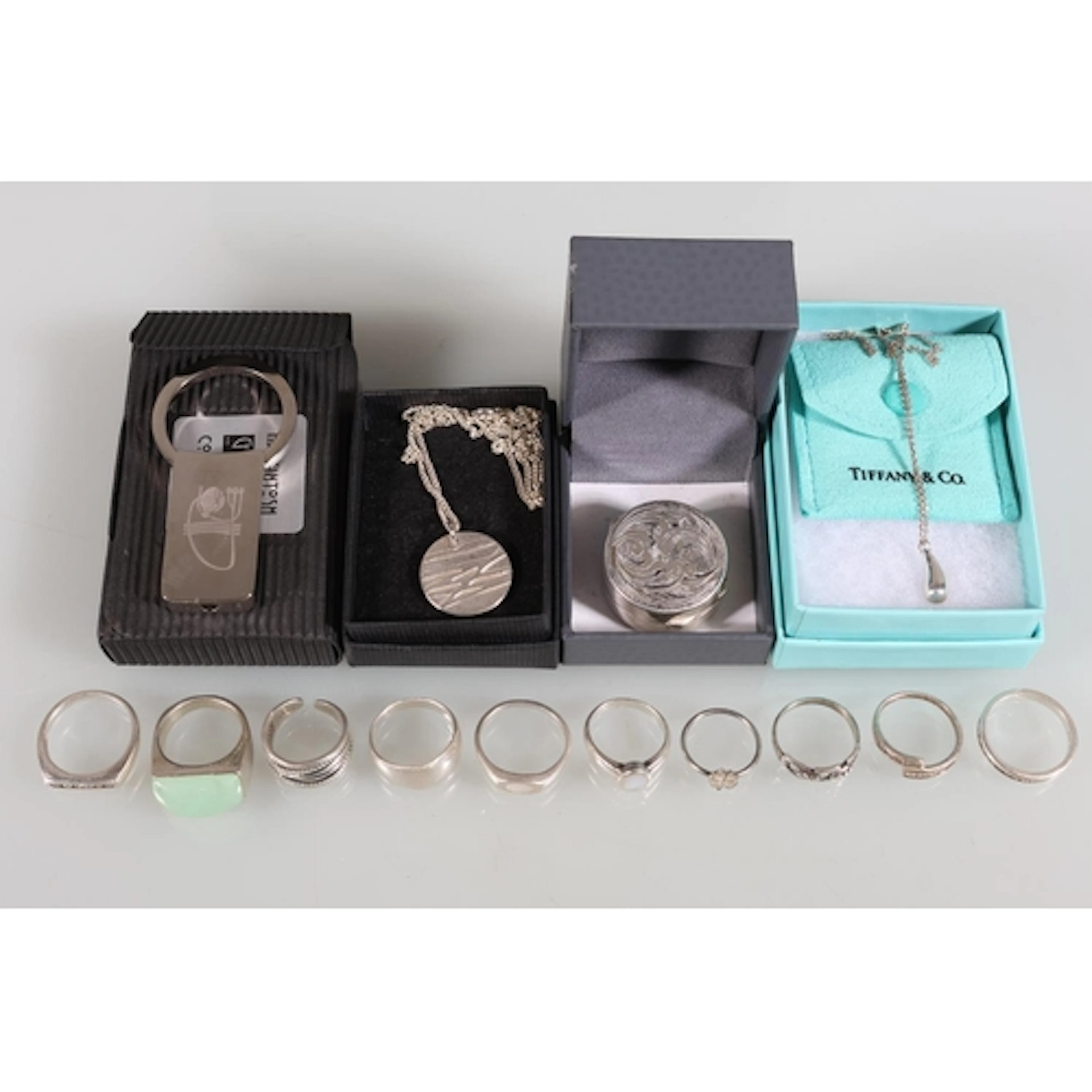 Modernist silver and other dress rings, a pendant in Tiffany...