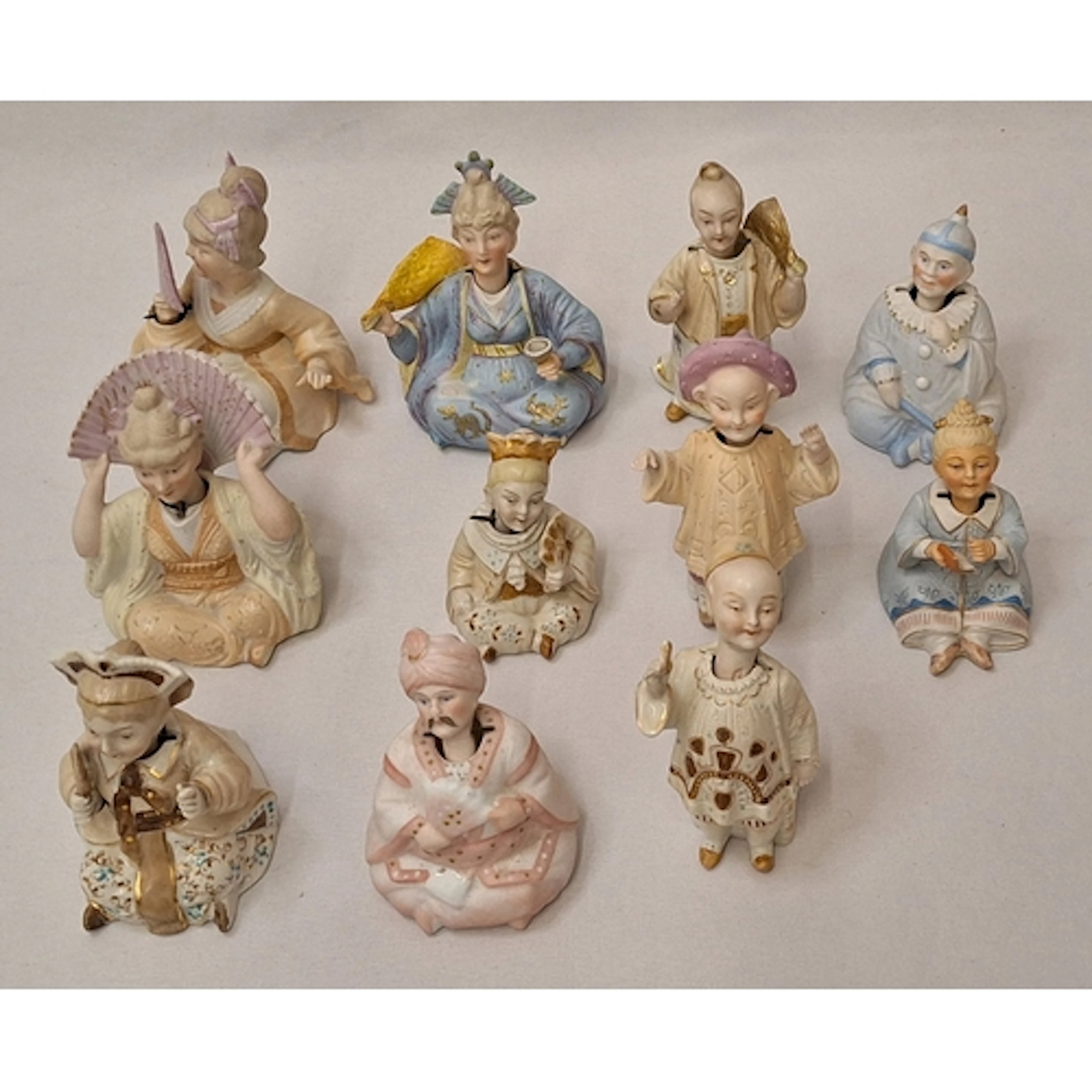 Nodding Head Figurines, caucasian figures in Oriental/Easter...