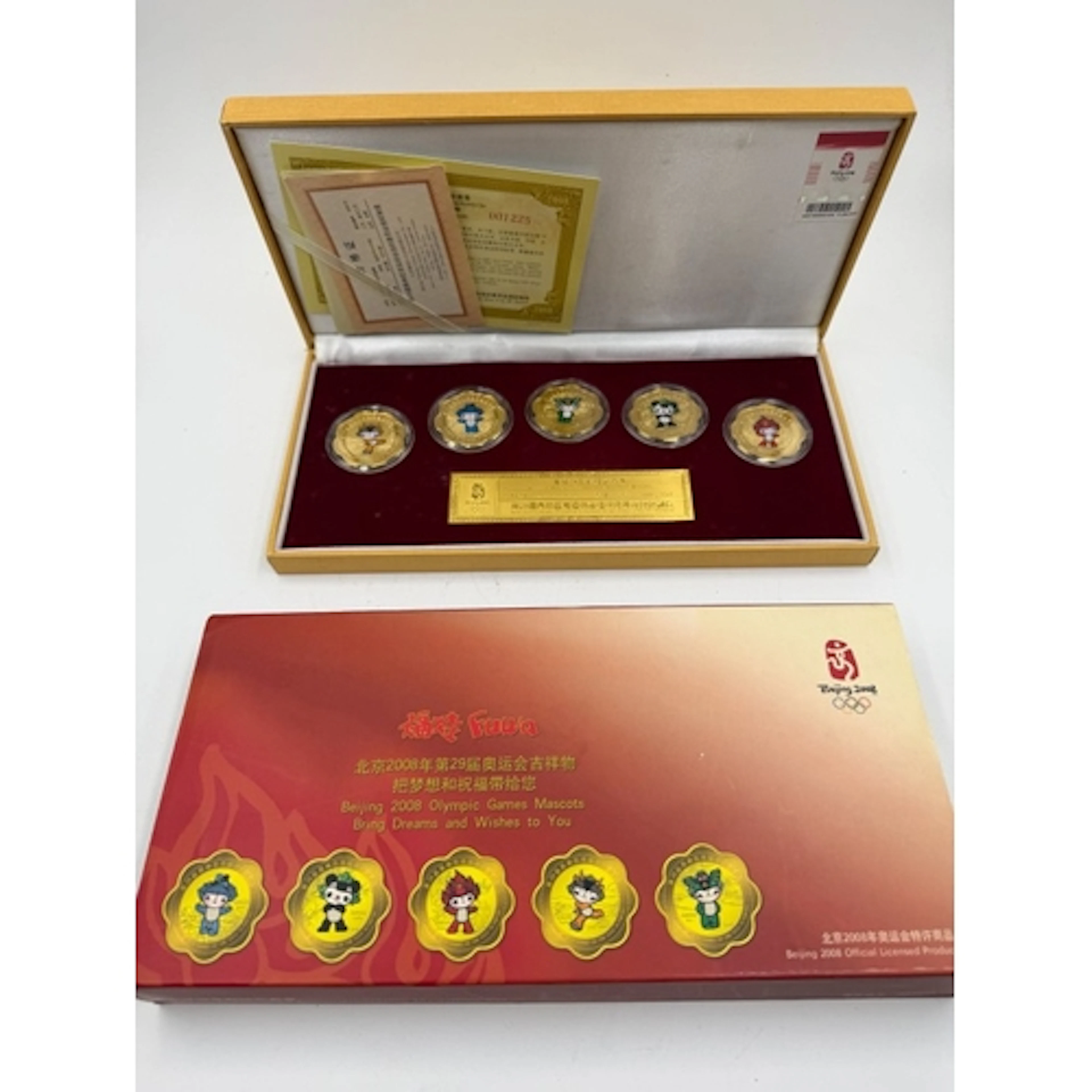 A 2008 Beijing Olympic Games mascot medal set by Fuwa, five ...