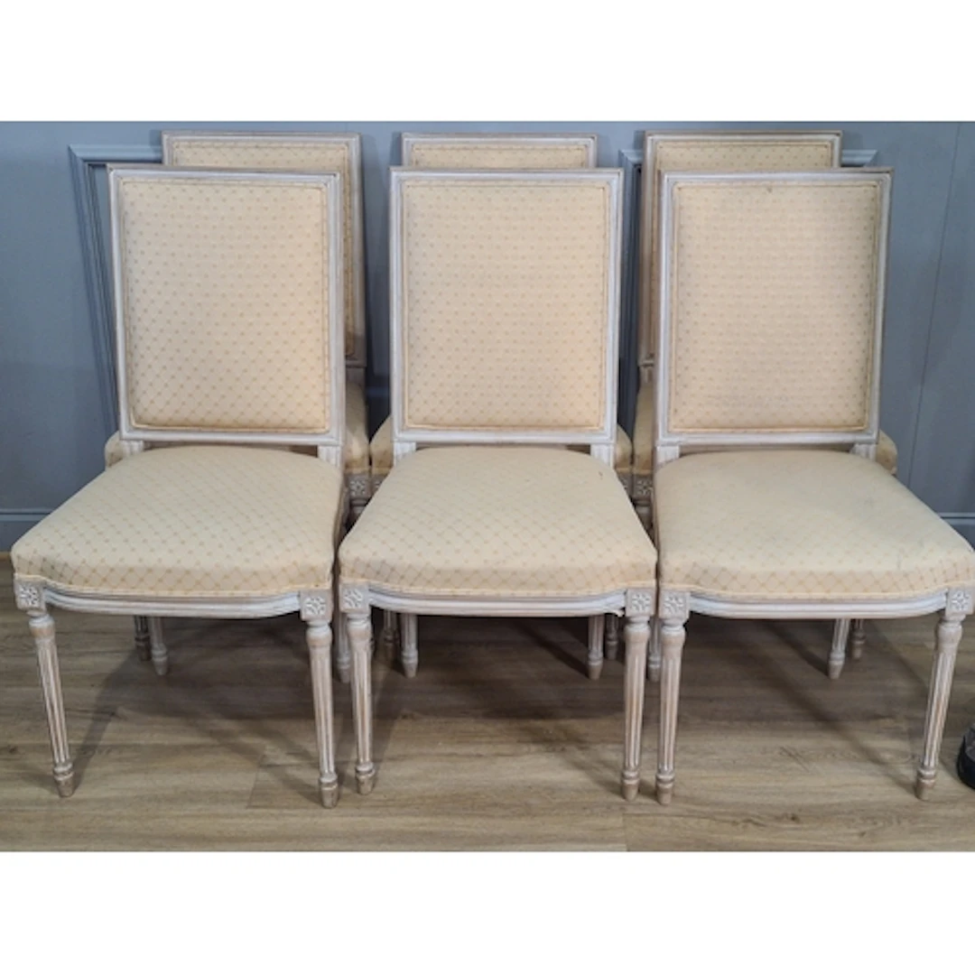 A set of six Louis XVI style Chairs with pale stuff over bac...