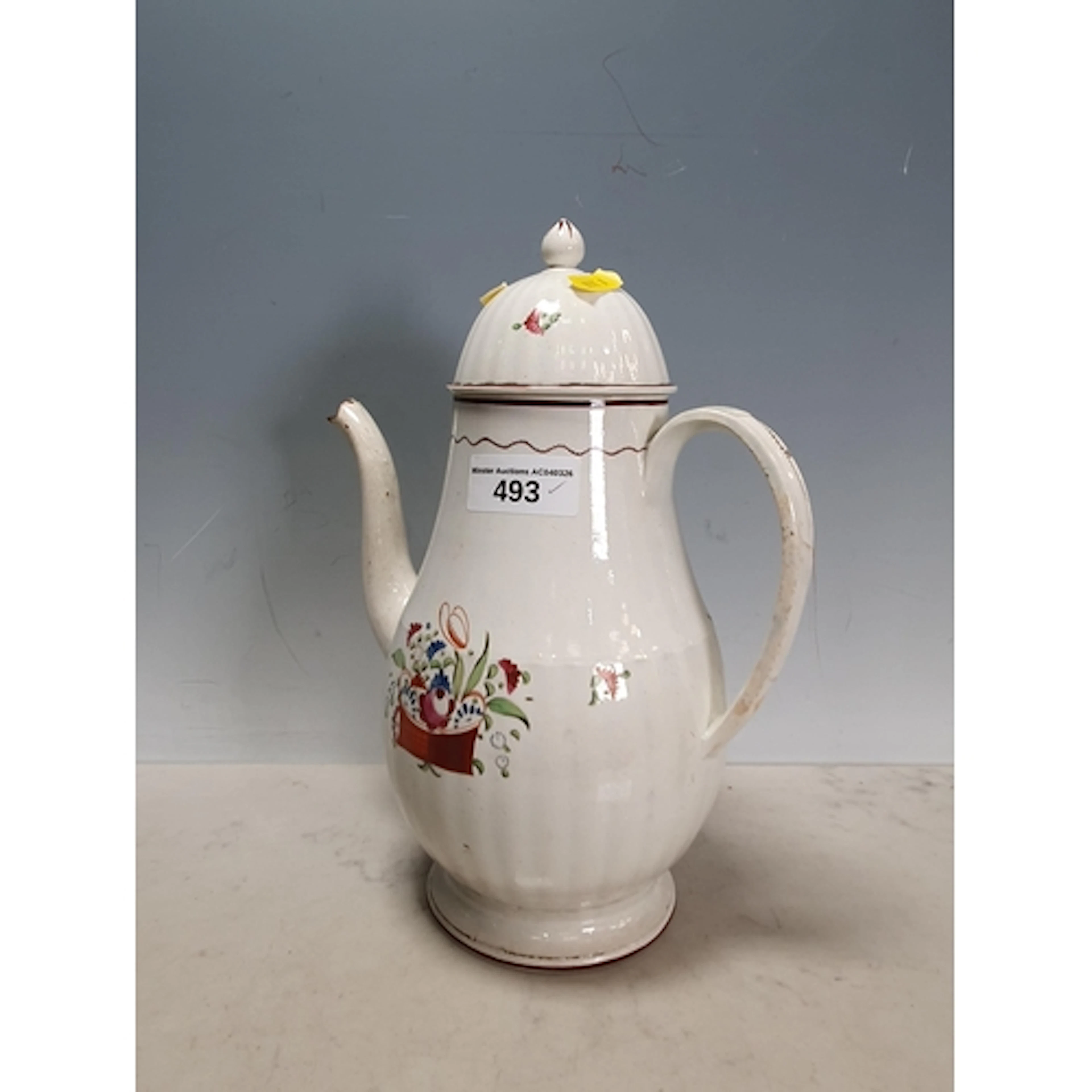 An early porcelain Coffee Pot, possibly Liverpool, stamped '...