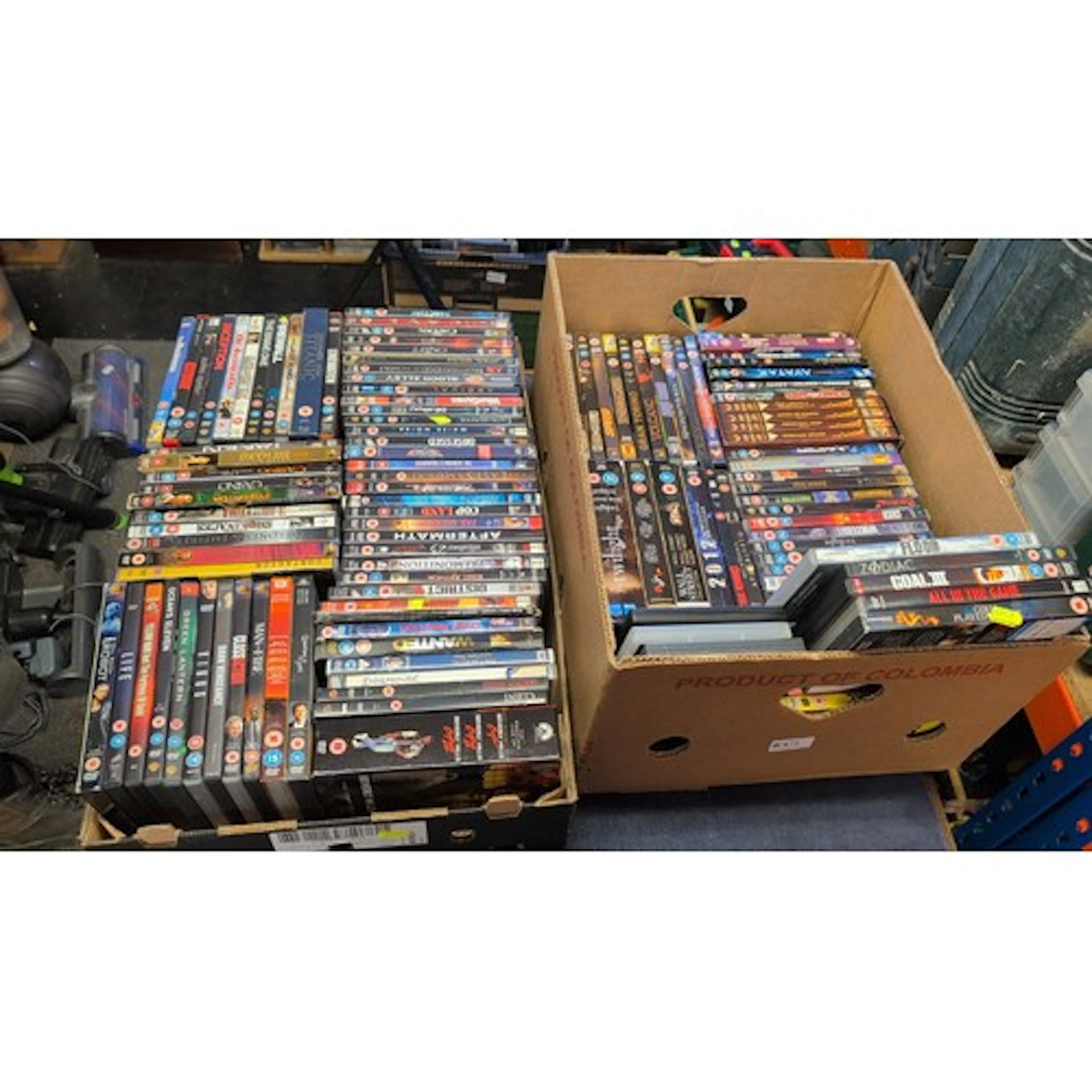 A quantity of feature film DVDs in original cases, including...