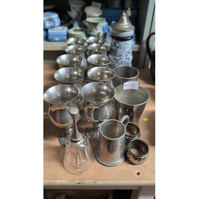 A group of pewter goblets, tankards and napkin rings, includ...