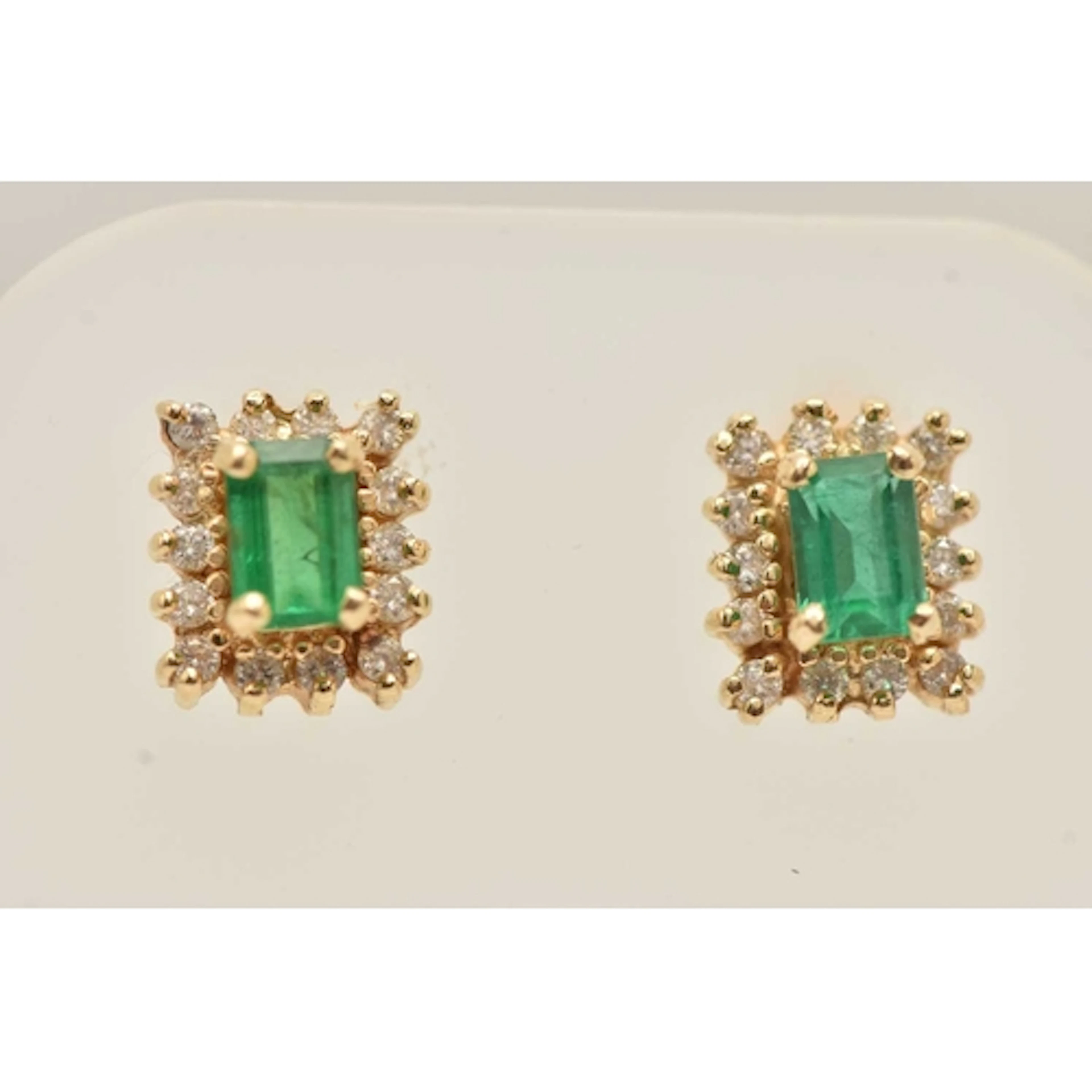 A PAIR OF YELLOW METAL EMERALD EARRINGS, emerald cut emerald...