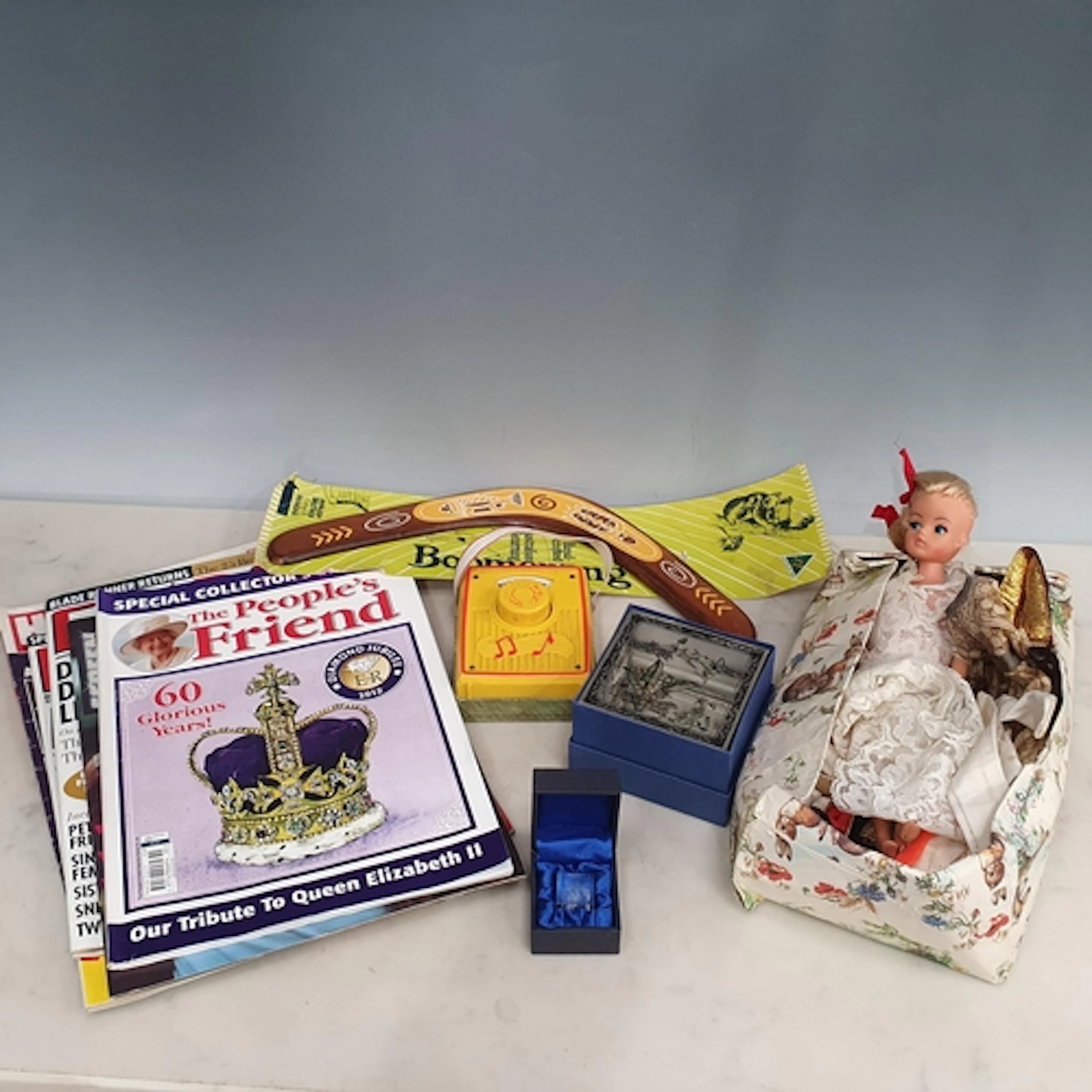 A vintage Sindy Doll with various outfits, a Fisher Price Mu...