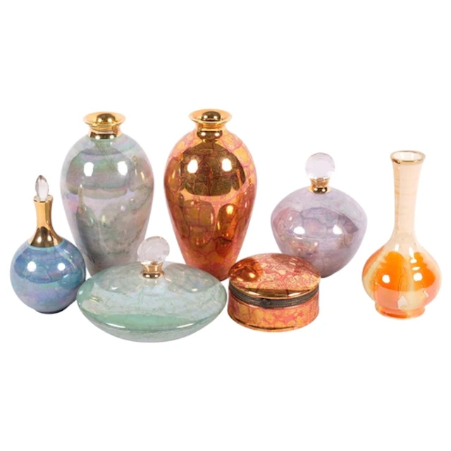 7 pieces of Atkinson-Jones lustreware, including scent bottl...