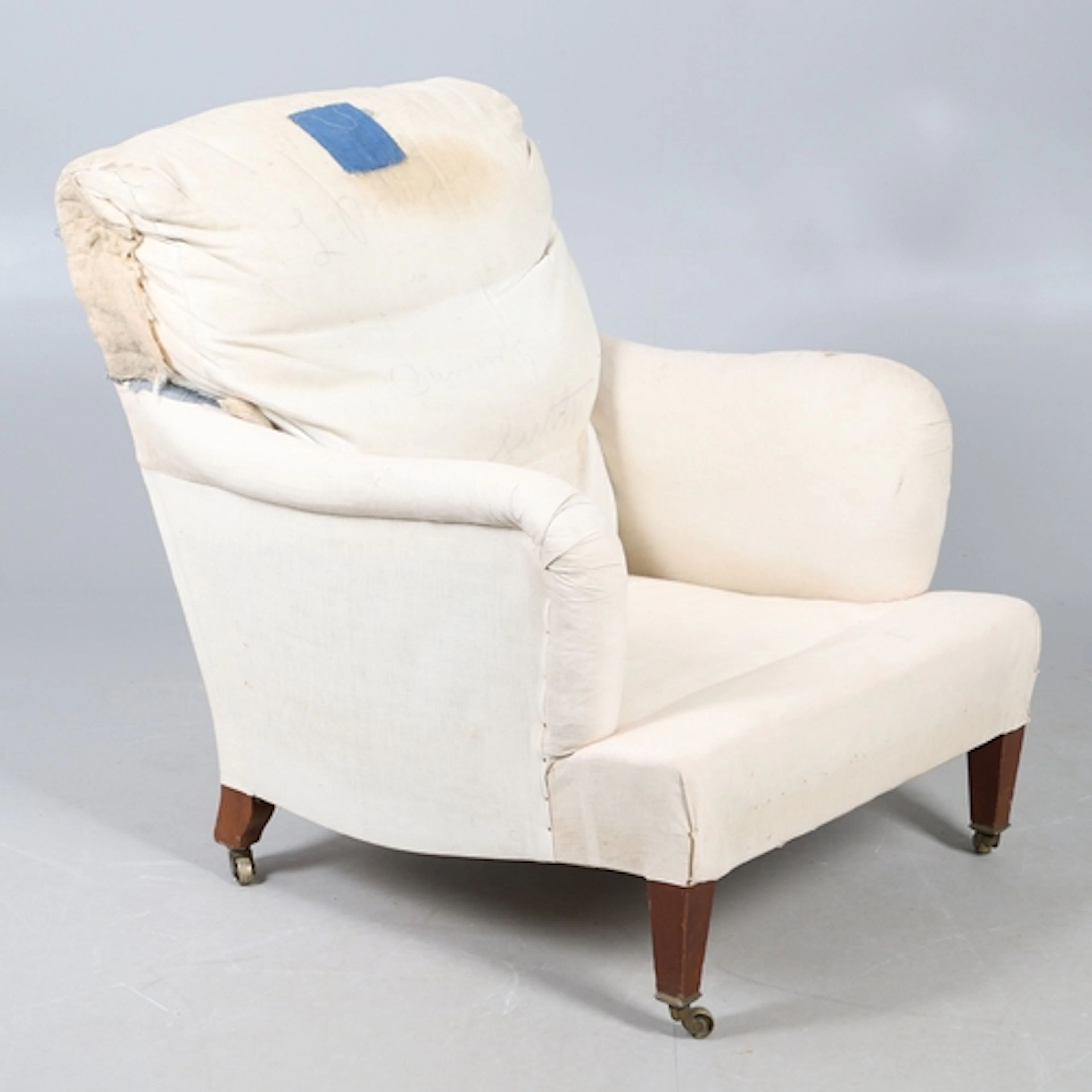A HOWARD & SONS 'BRIDGEWATER' MAHOGANY ARMCHAIR, CIRCA 1900....